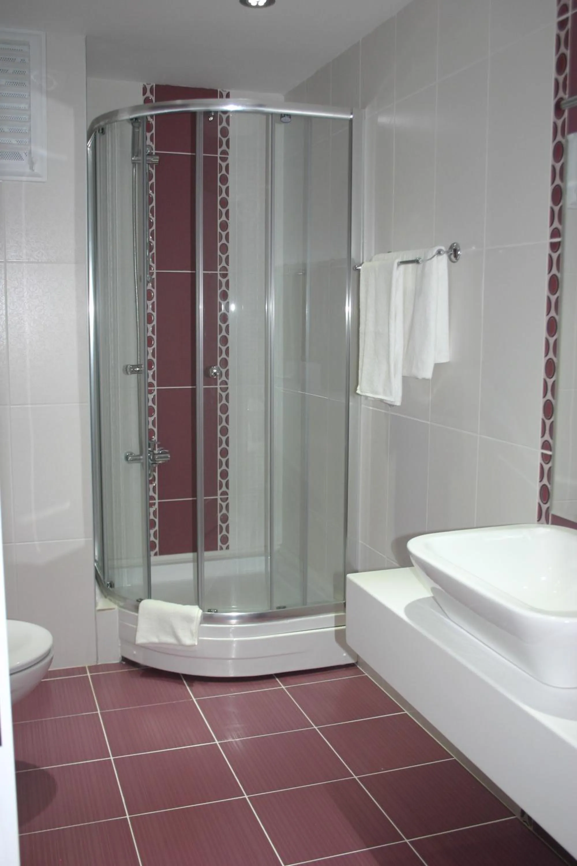 Bathroom in Grand Ahos Hotel