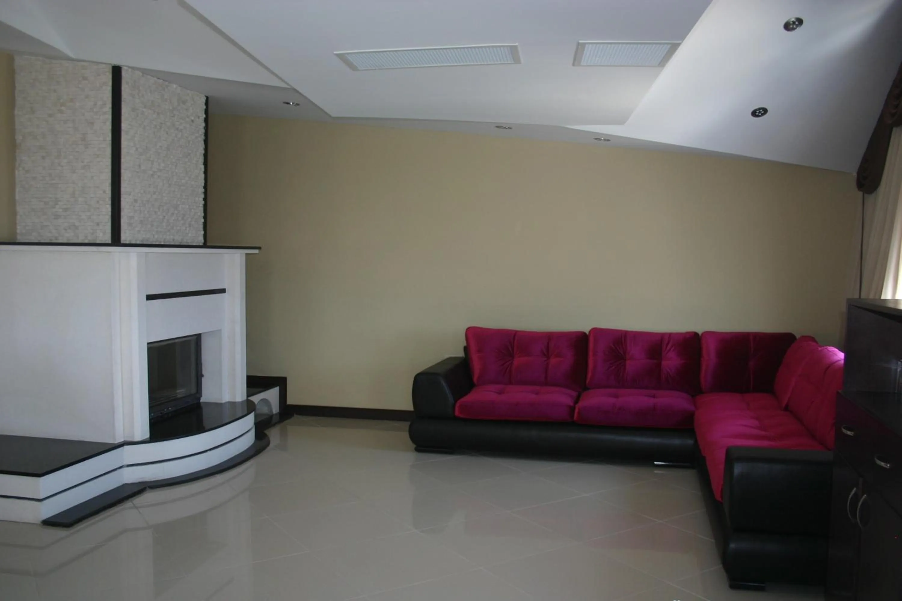 Communal lounge/ TV room in Grand Ahos Hotel