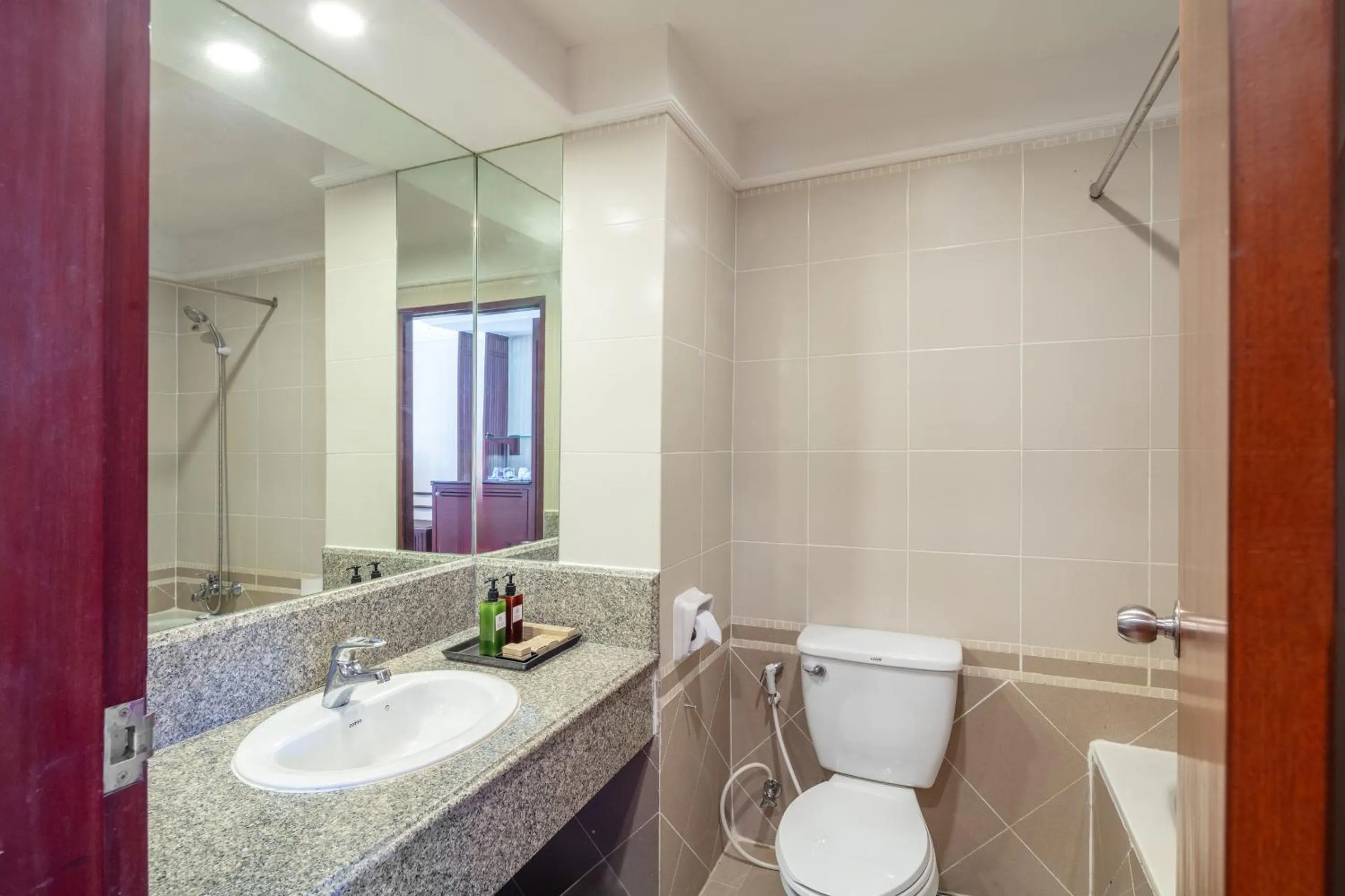 Shower in Tawa Ravadee Resort Prachinburi, a member of WorldHotels Distinctive