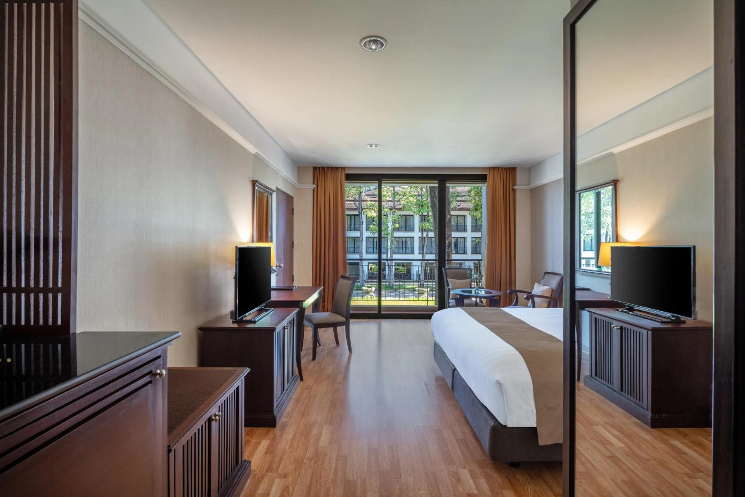 Bed in Tawa Ravadee Resort Prachinburi, a member of WorldHotels Distinctive