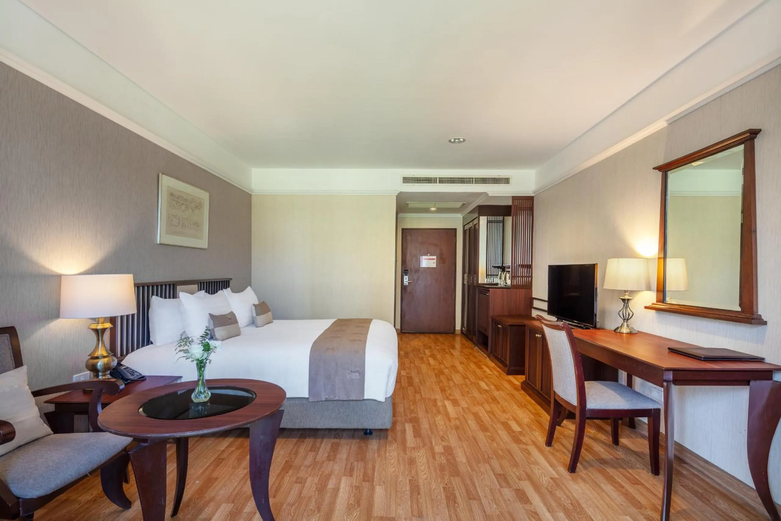 Bed in Tawa Ravadee Resort Prachinburi, a member of WorldHotels Distinctive