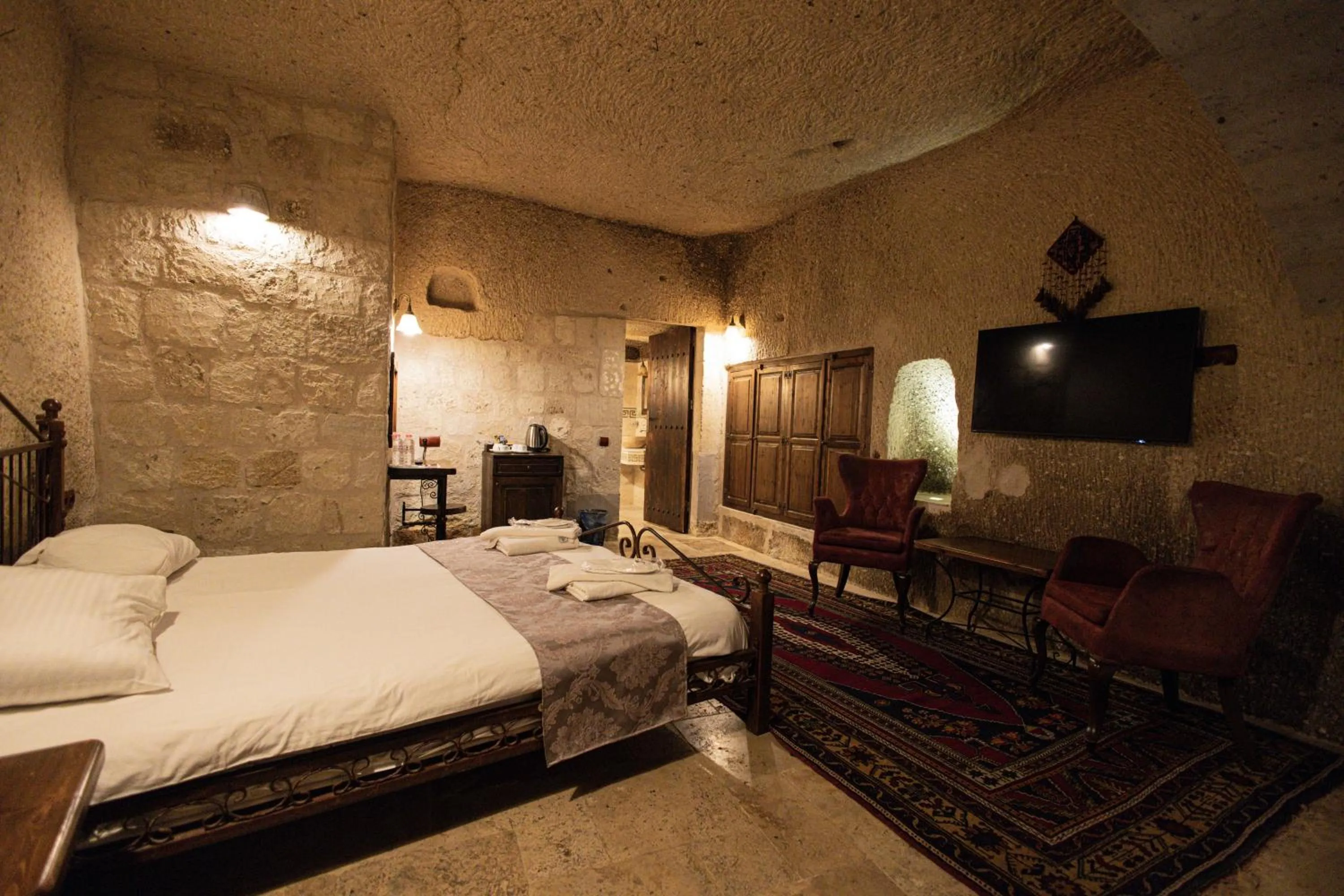 Bed in Century Cave Hotel