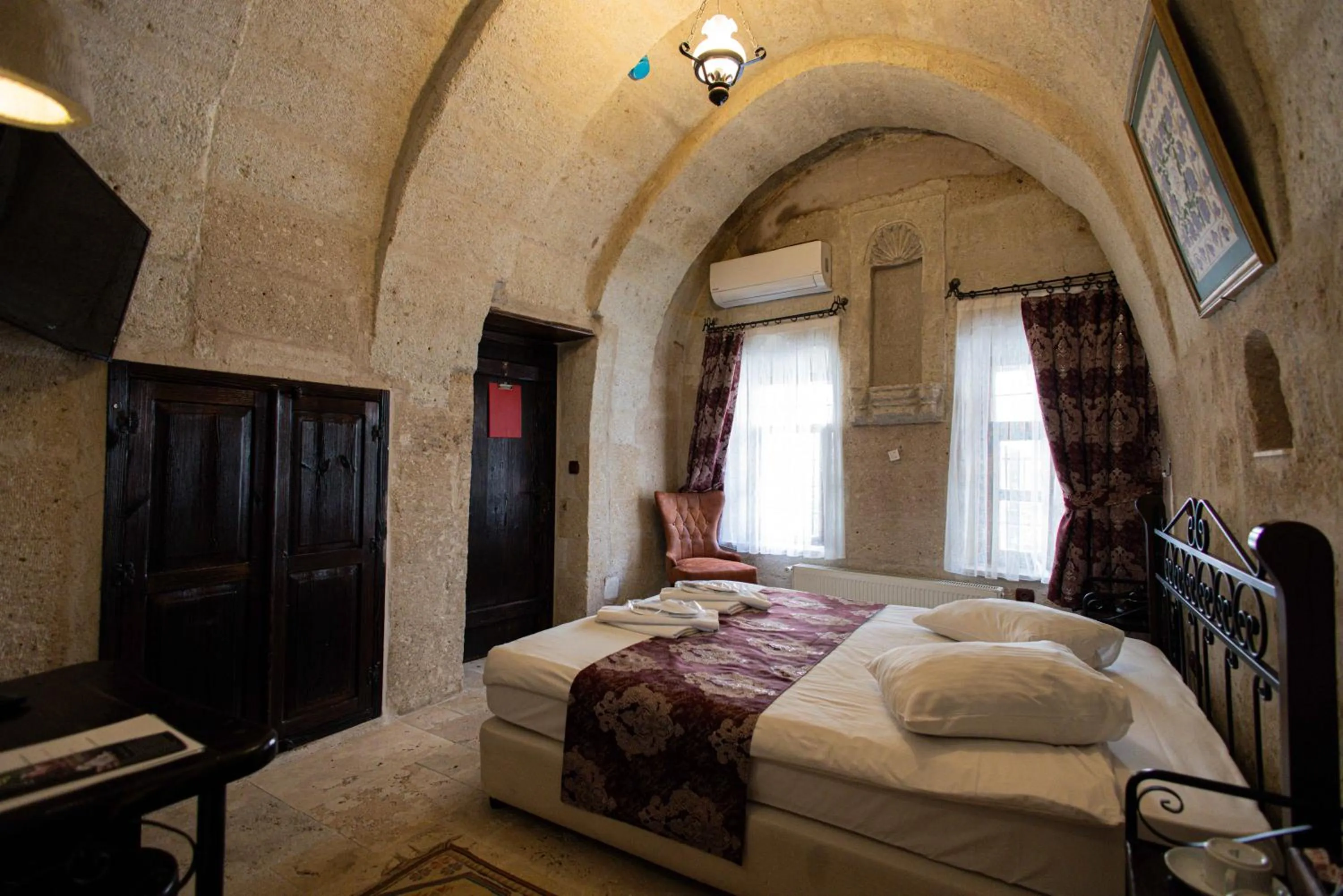 Bed in Century Cave Hotel
