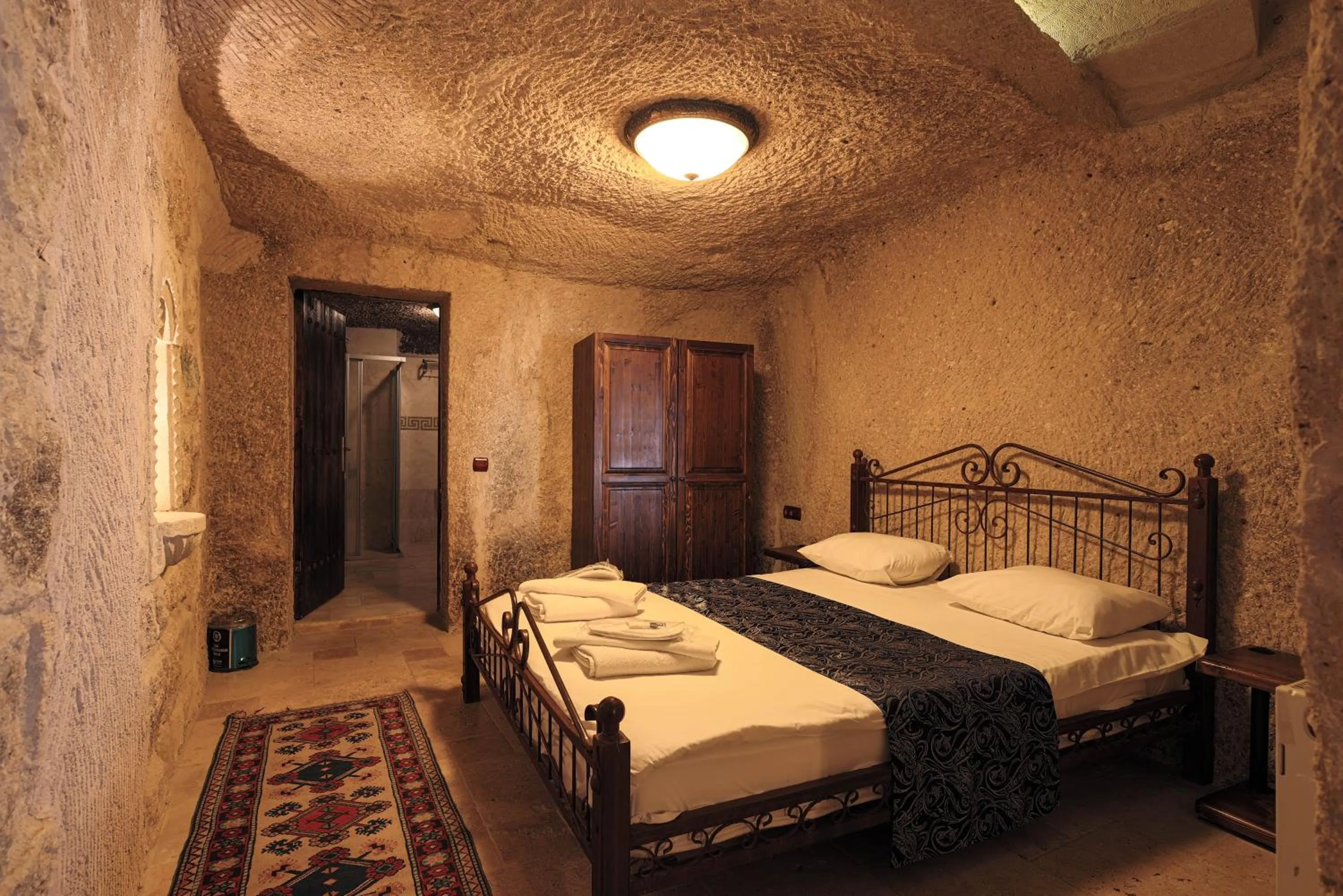 Bed in Century Cave Hotel