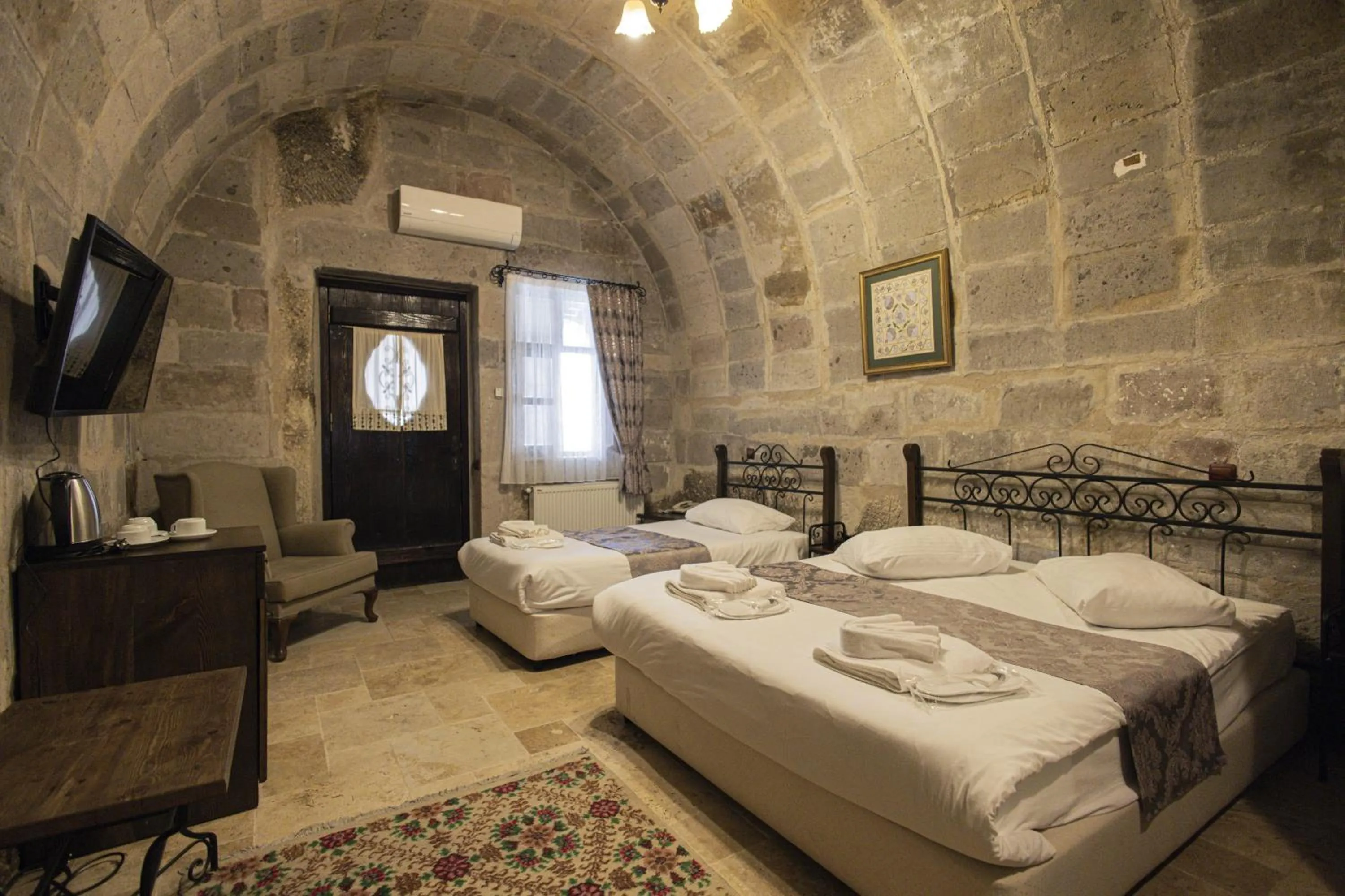 Bed in Century Cave Hotel