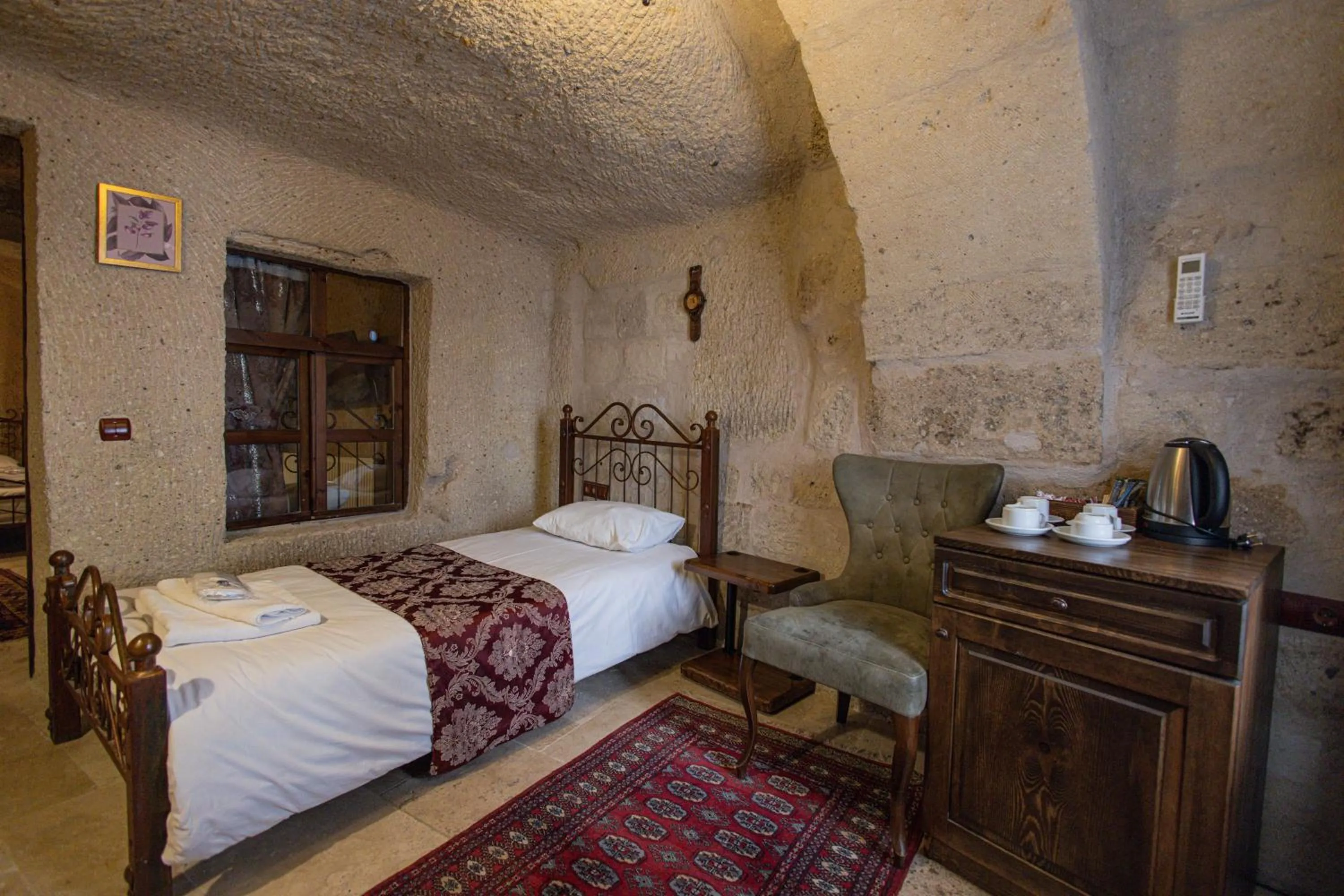 Bed in Century Cave Hotel