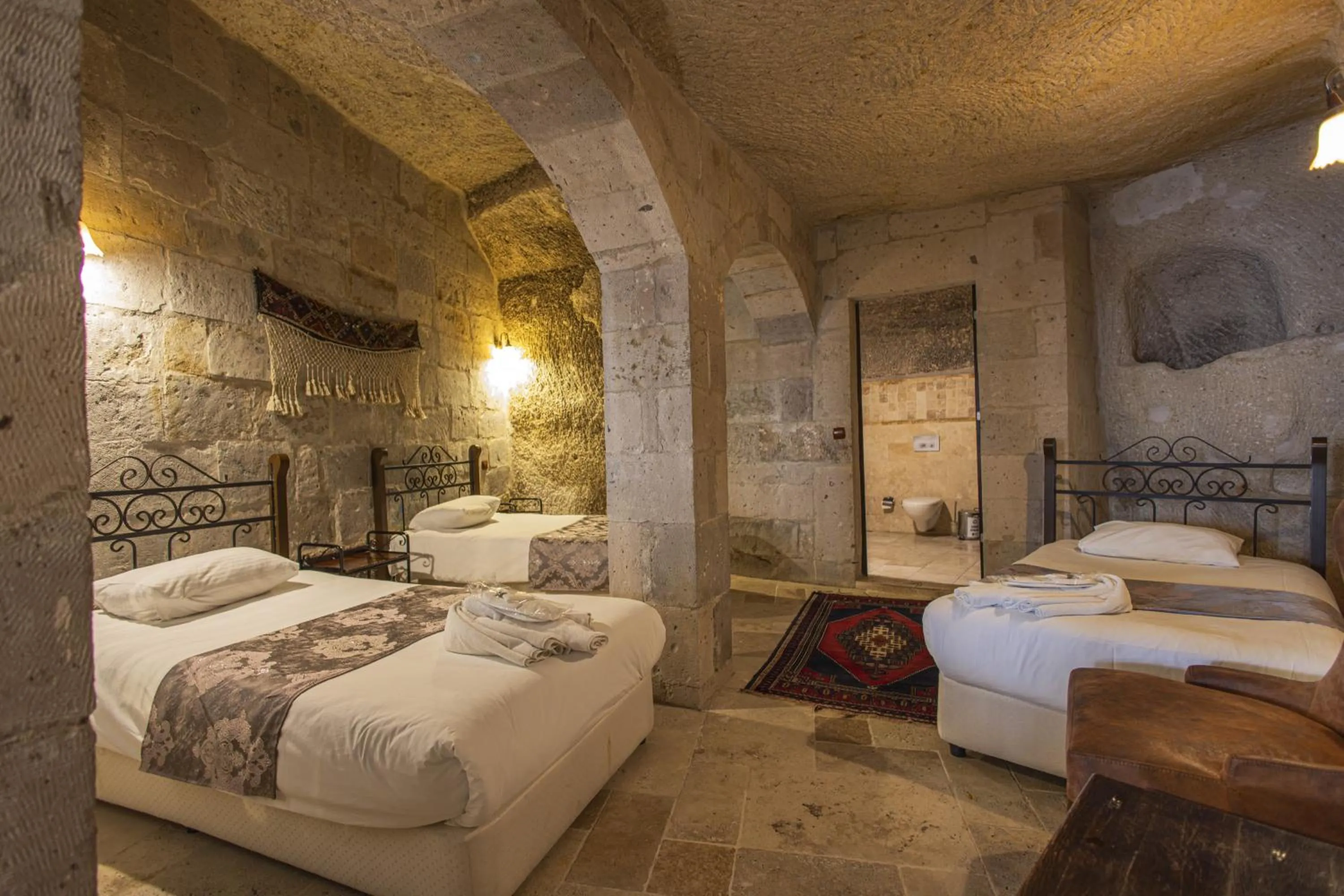 Bed in Century Cave Hotel
