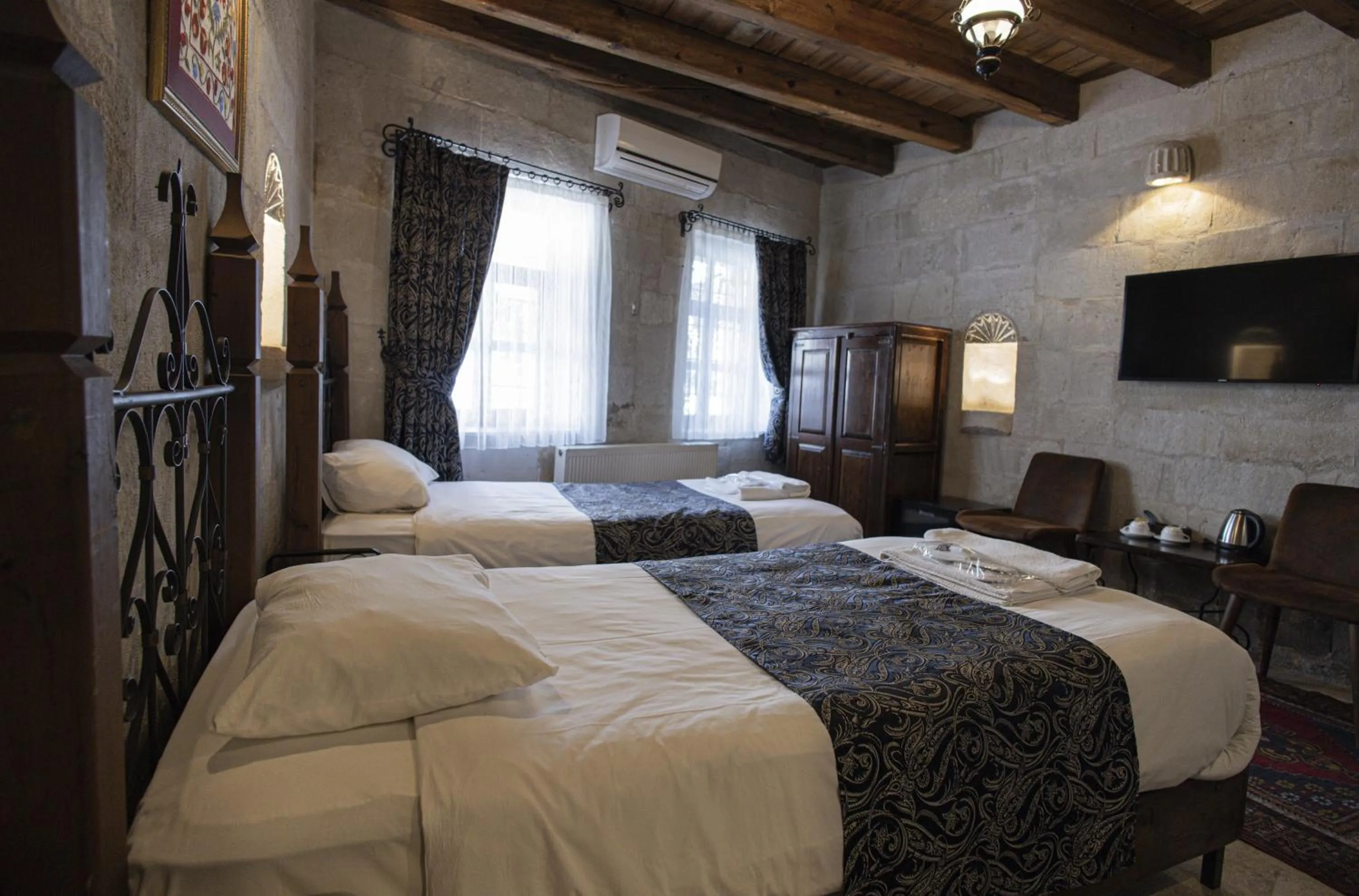 Bed in Century Cave Hotel