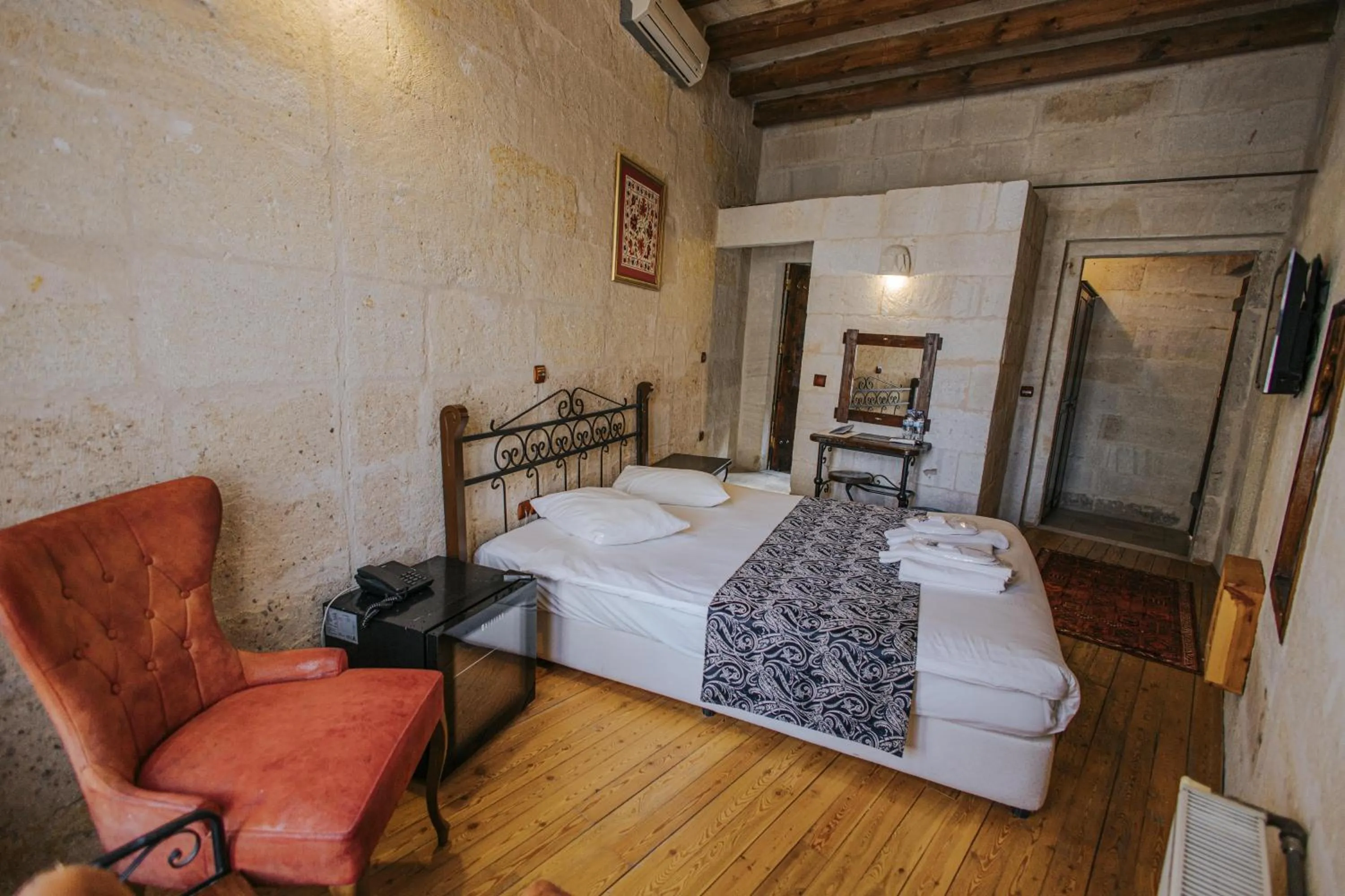 Bed in Century Cave Hotel