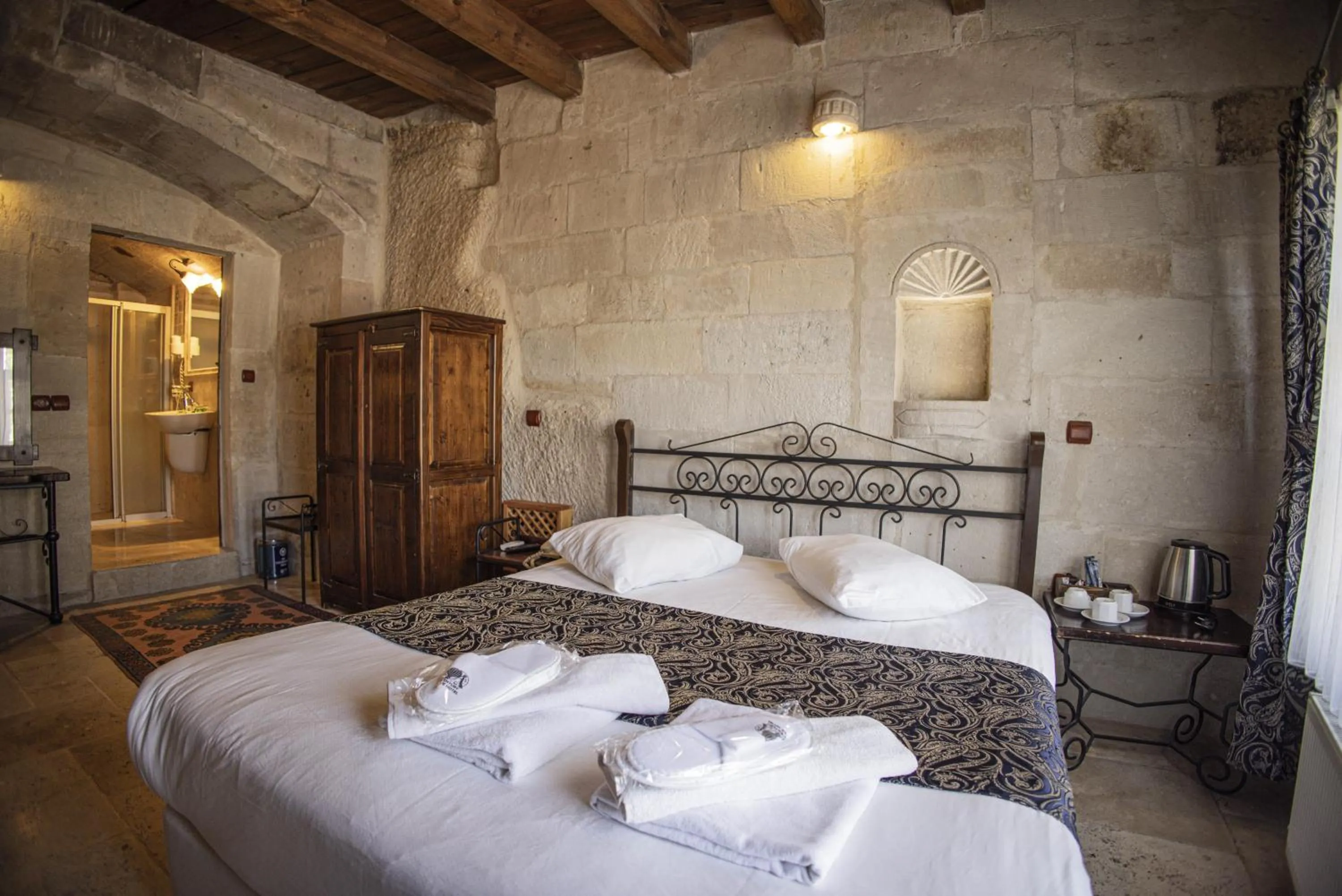 Bed in Century Cave Hotel