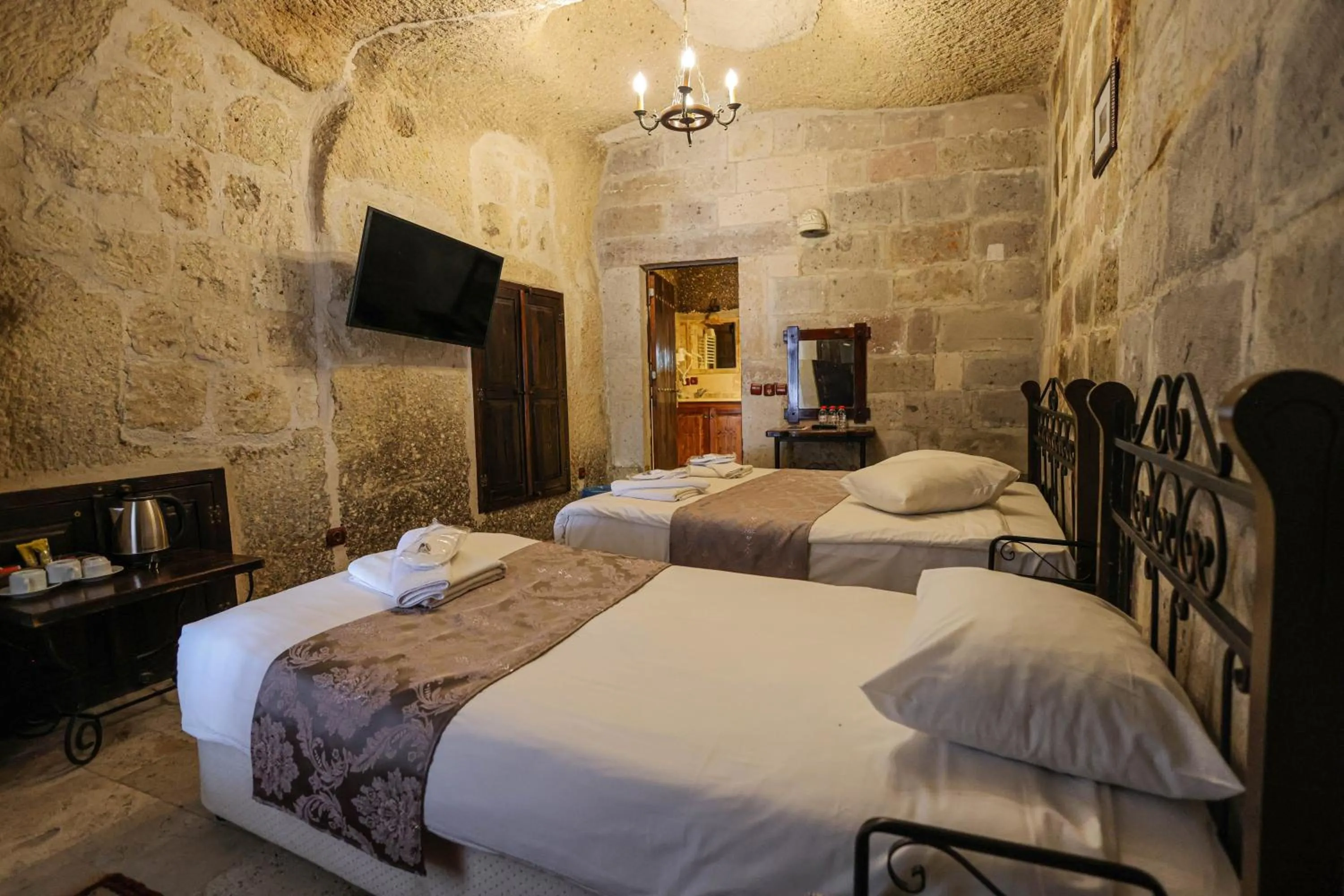 Bed in Century Cave Hotel