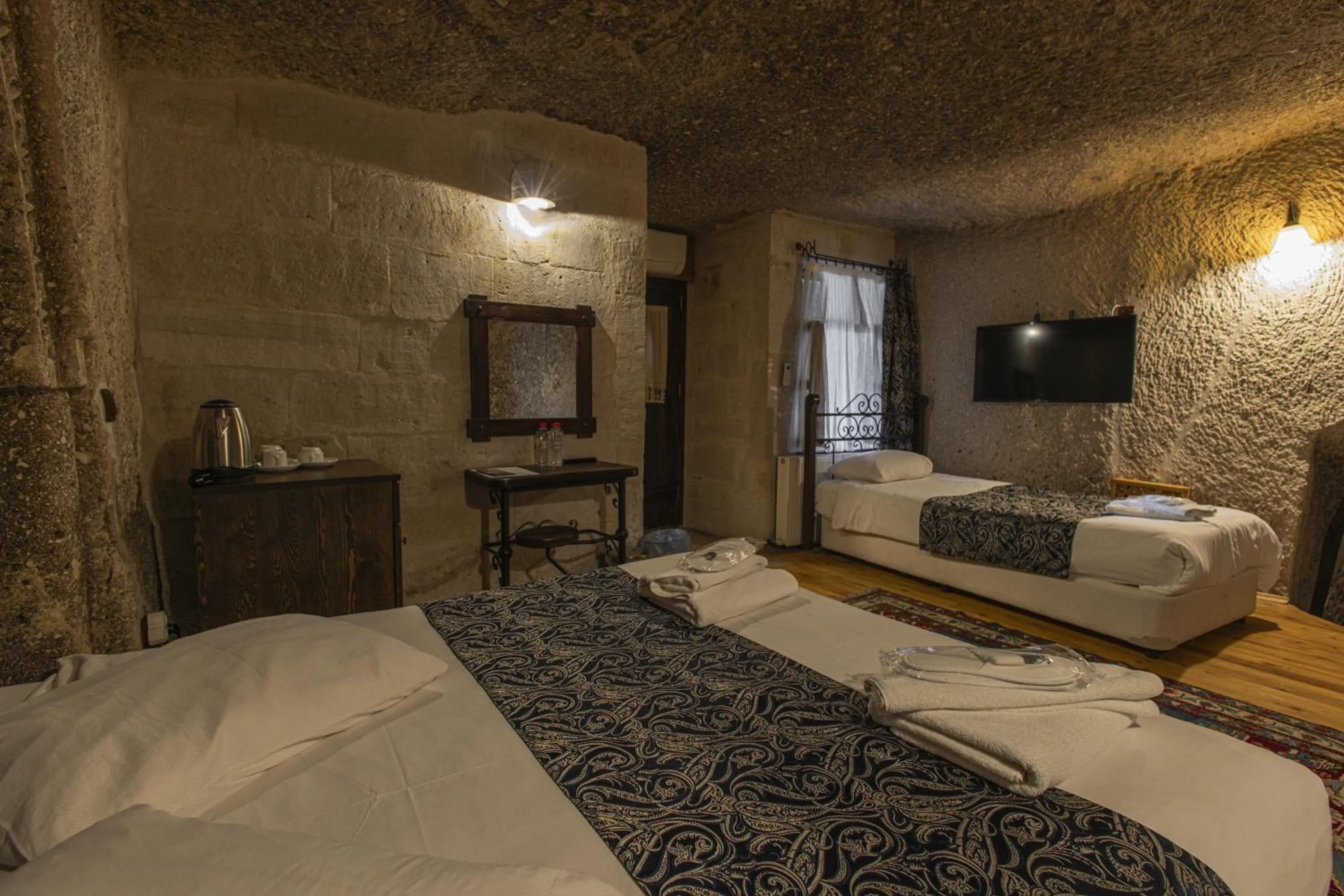 Bed in Century Cave Hotel