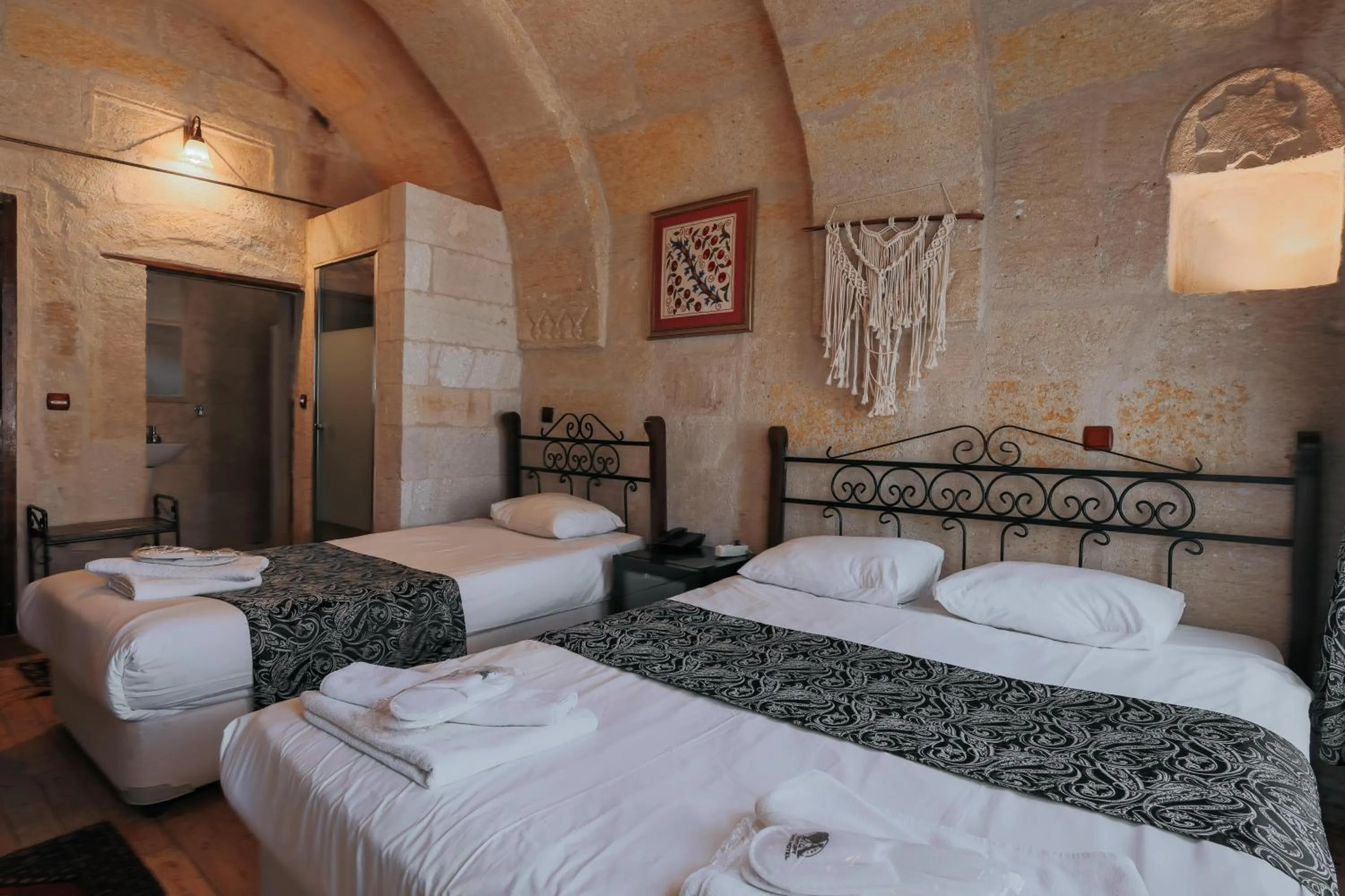 Bed in Century Cave Hotel