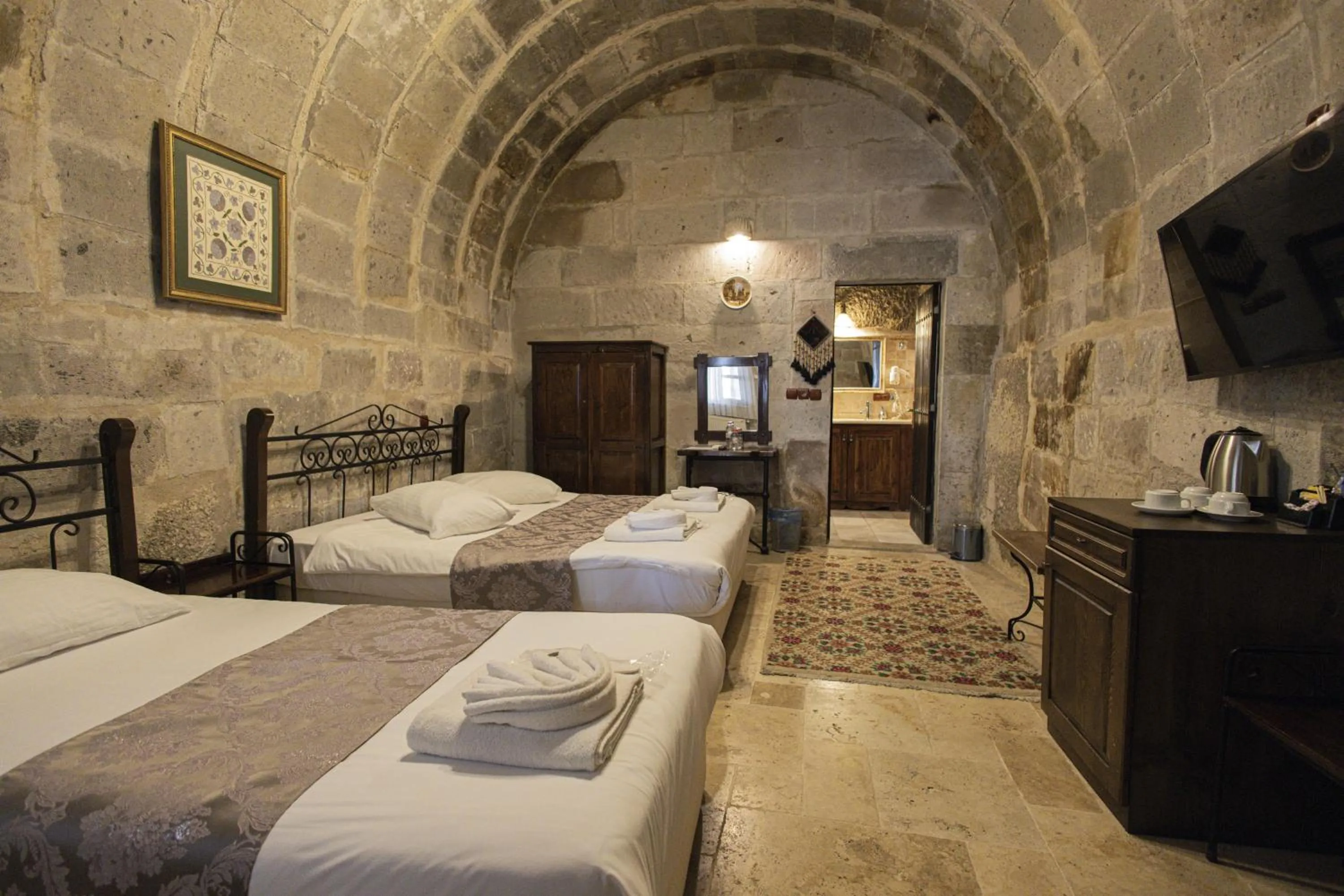 Bed in Century Cave Hotel