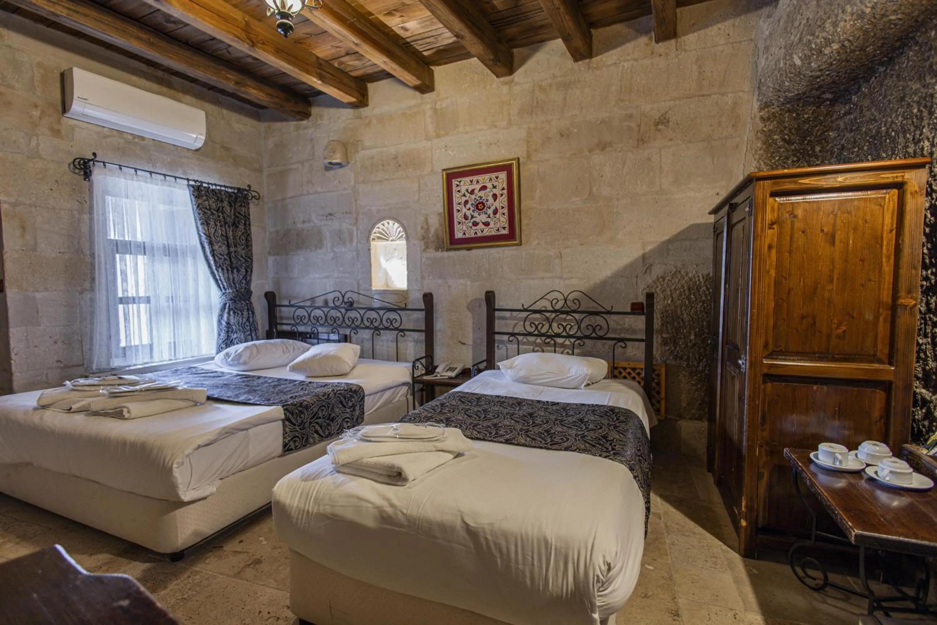 Bed in Century Cave Hotel