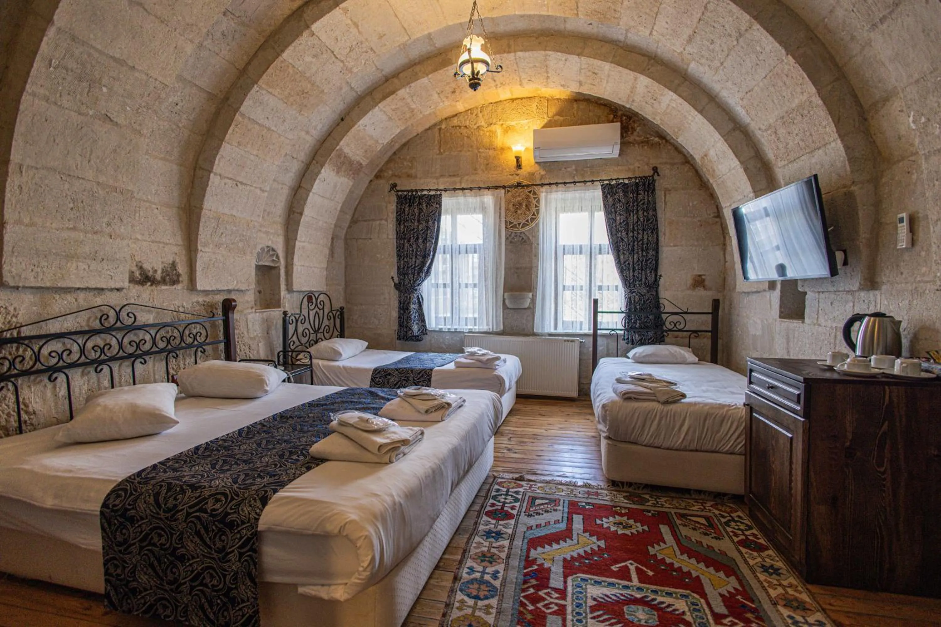 Bed in Century Cave Hotel