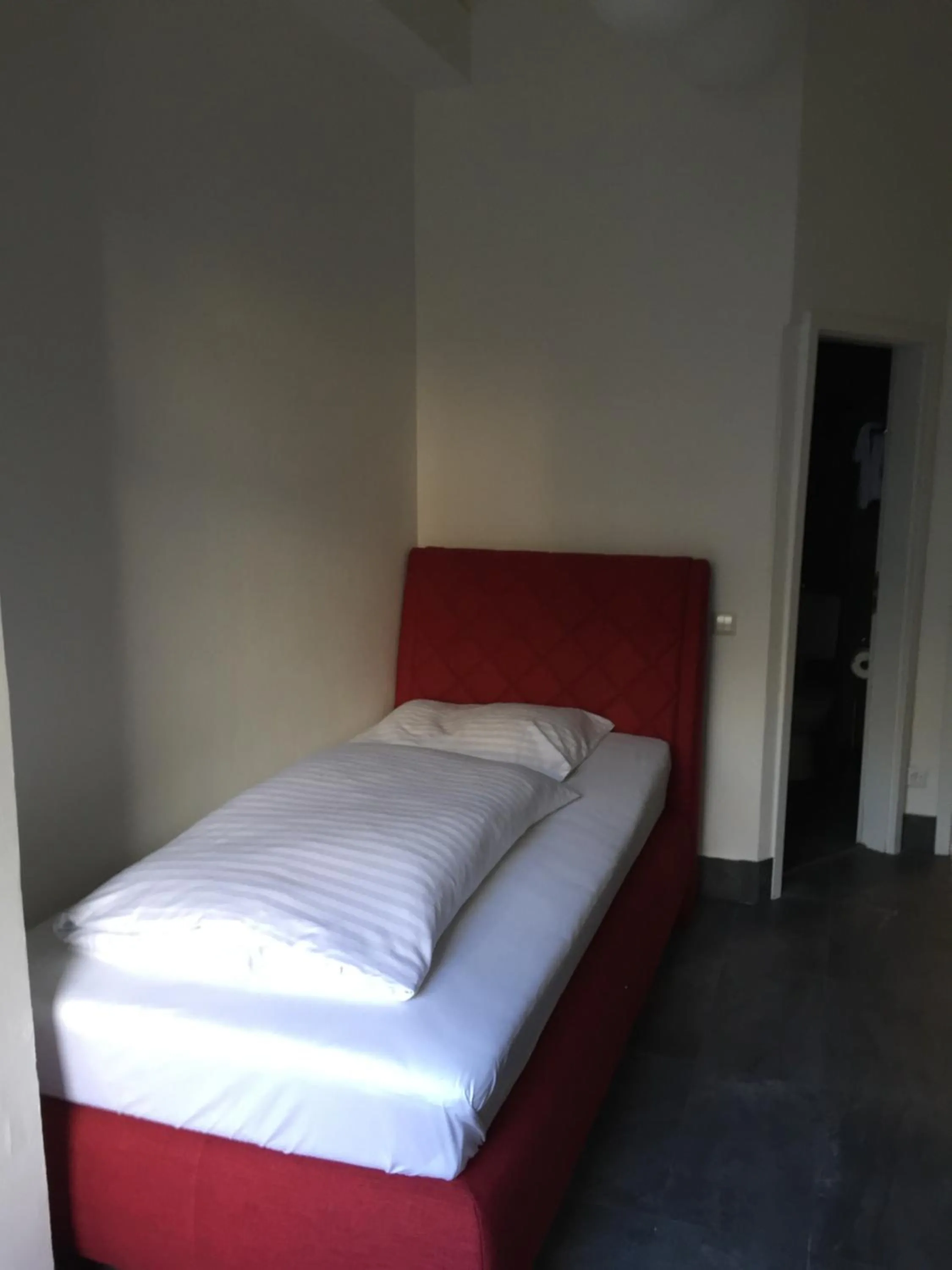 Photo of the whole room, Bed in Wasserturm Hotel Mannheim