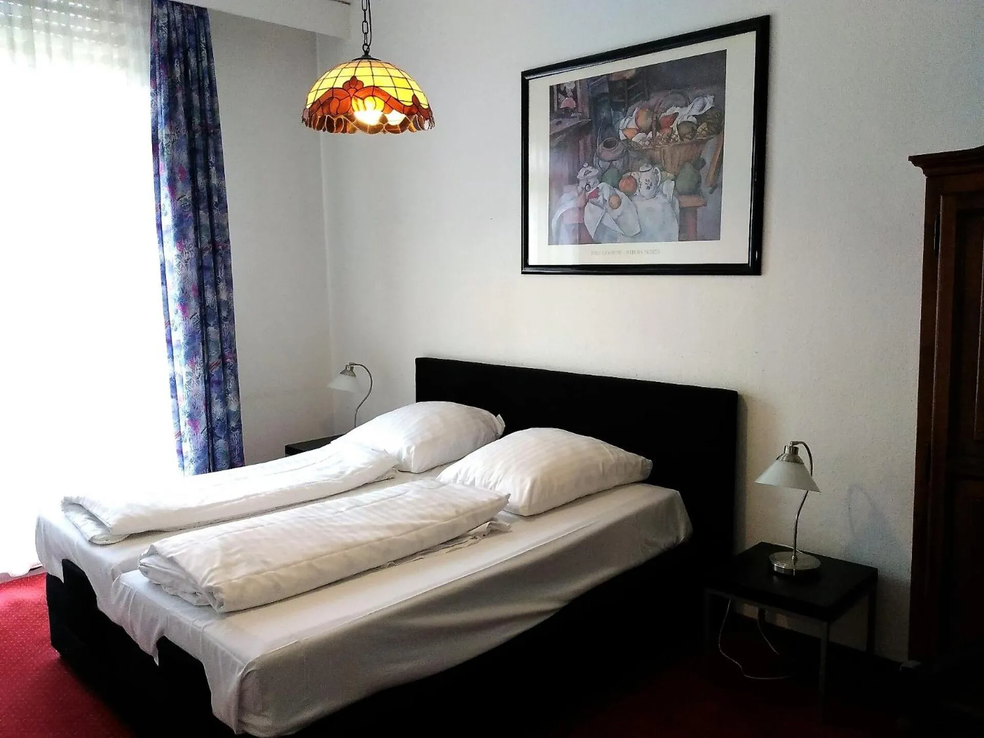 Photo of the whole room, Bed in Wasserturm Hotel Mannheim