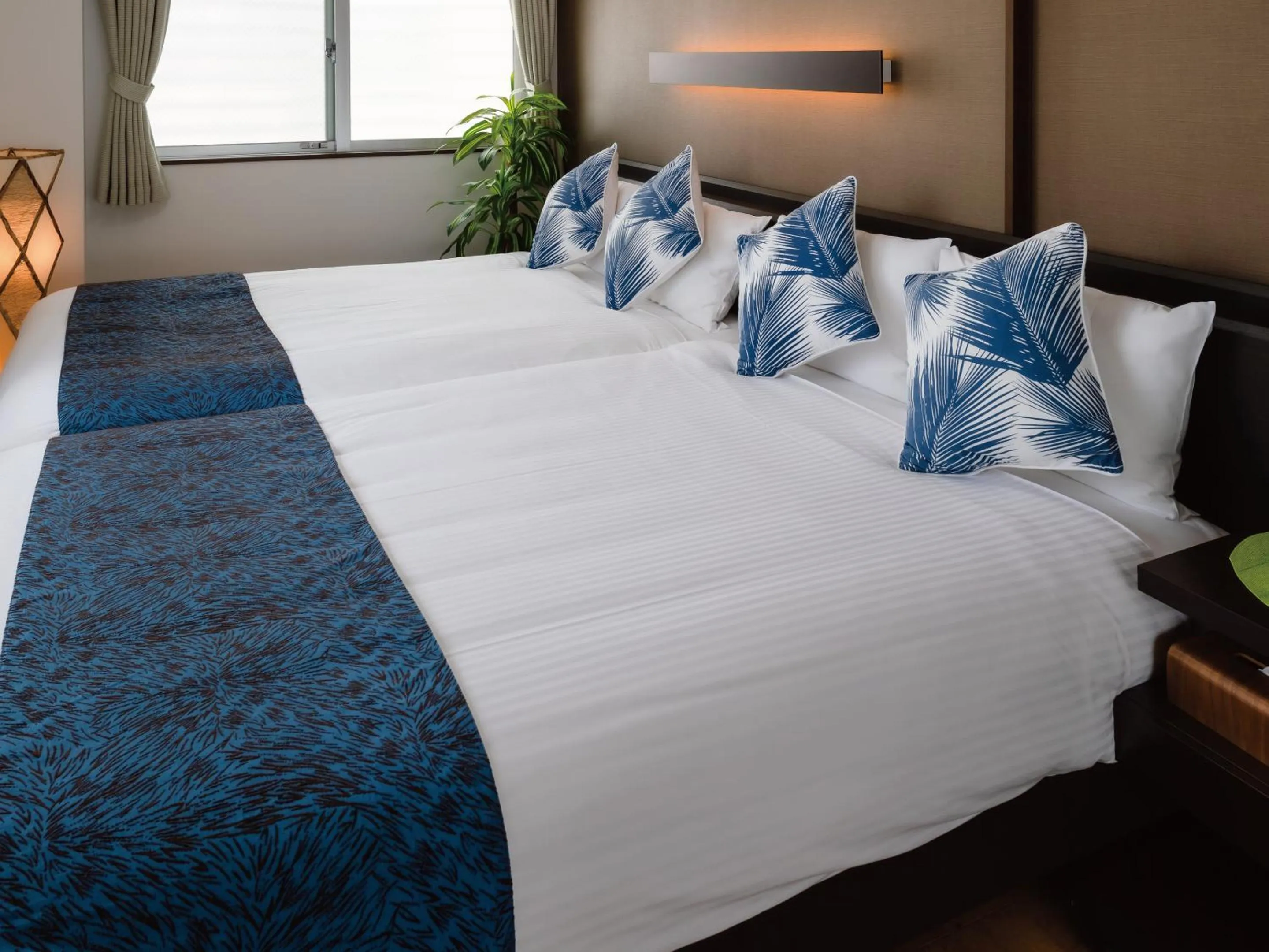 Bed in Zoe Resort The Sunset Village Okinawa Chatan