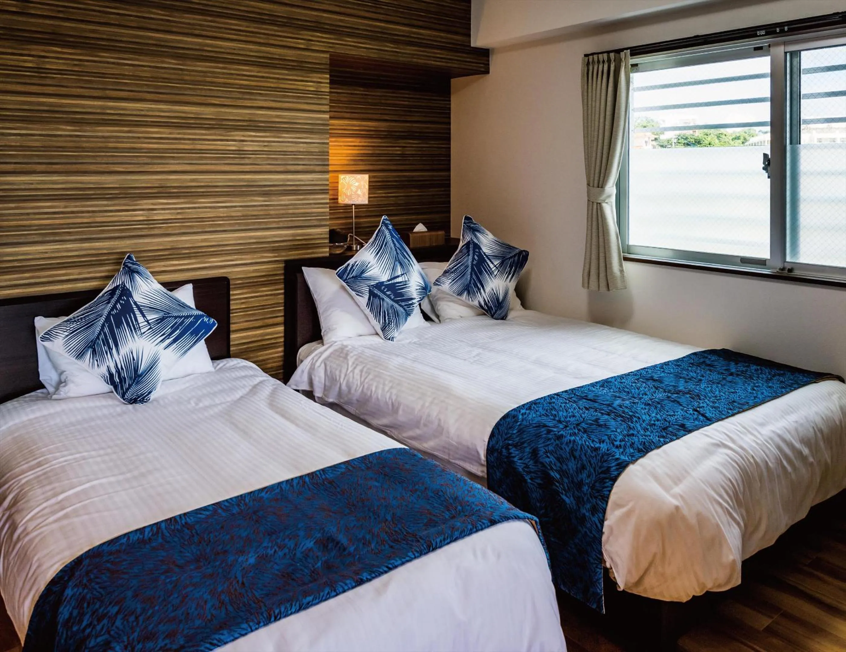 Bed in Zoe Resort The Sunset Village Okinawa Chatan