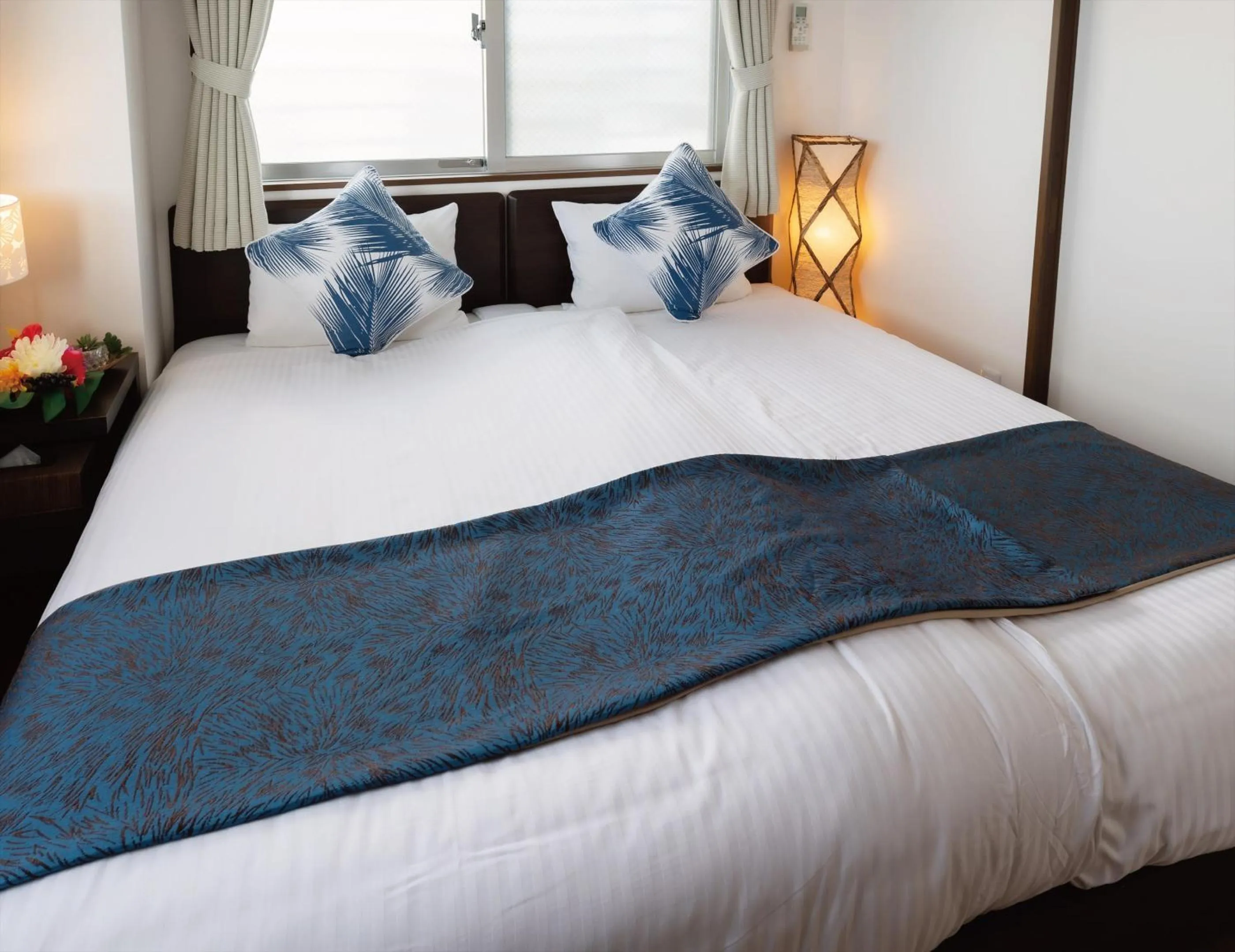 Bed in Zoe Resort The Sunset Village Okinawa Chatan