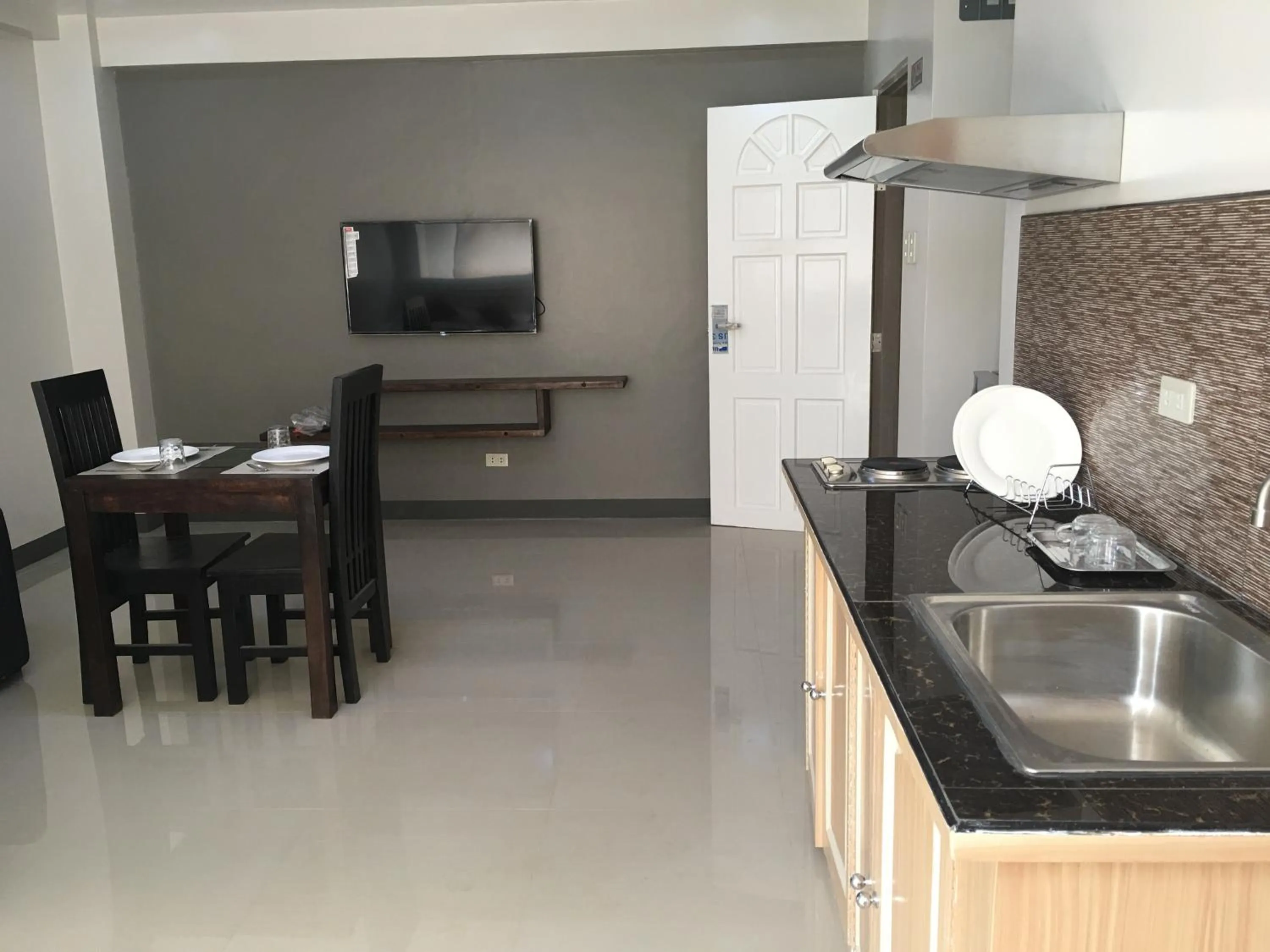 Kitchen or kitchenette in Beinte Singko de Marso Apartments