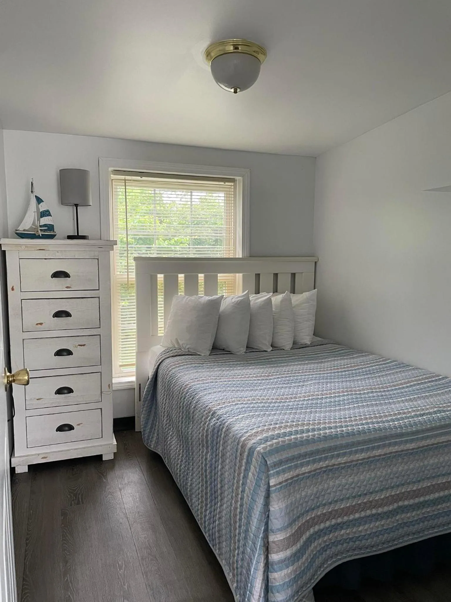 Bed in The Grand Beach Inn