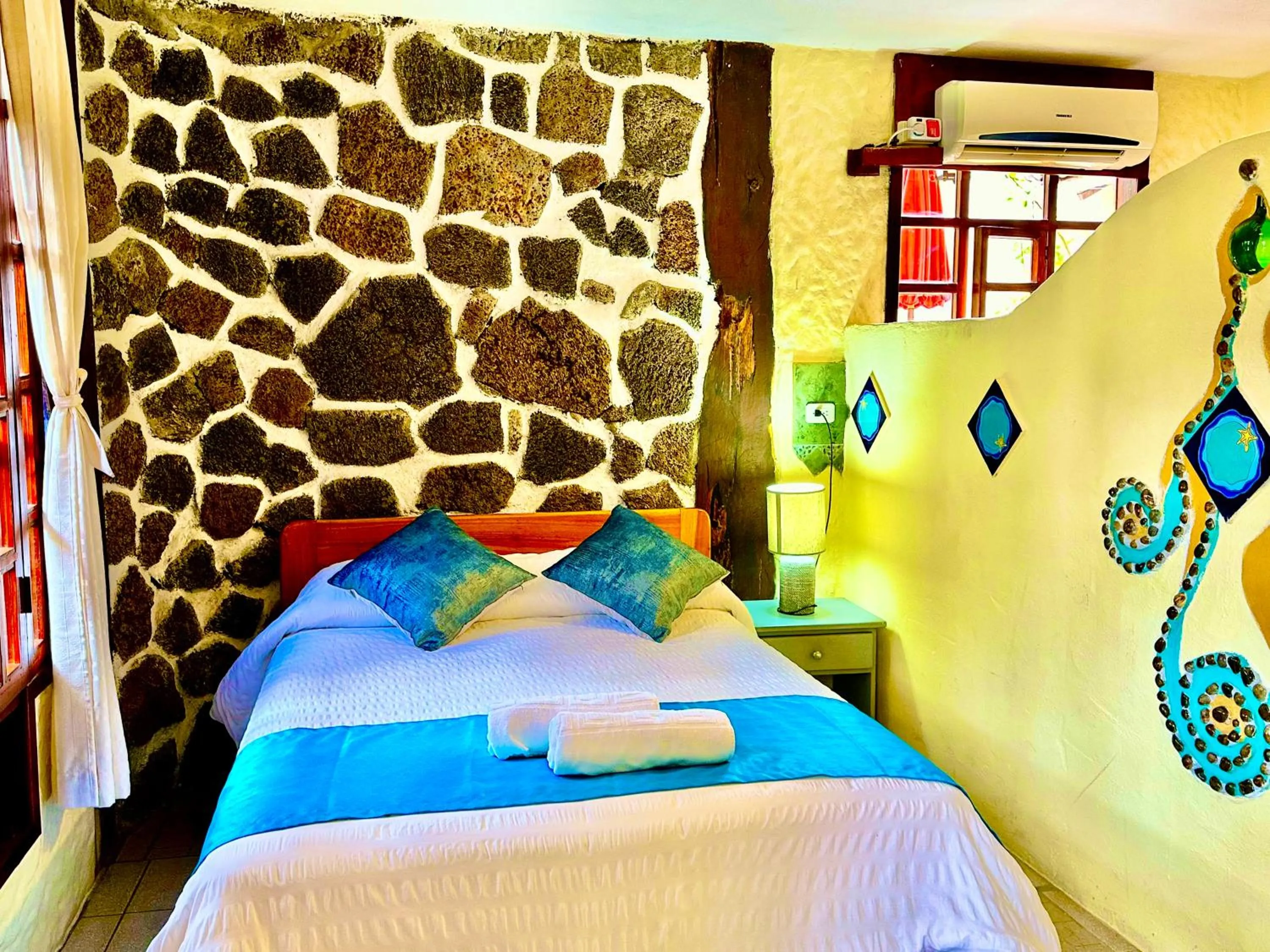 Bed in Casa del Lago Lodging House