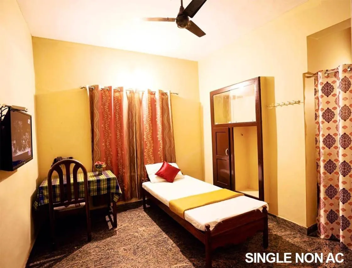 Bed in Surabhi Suites