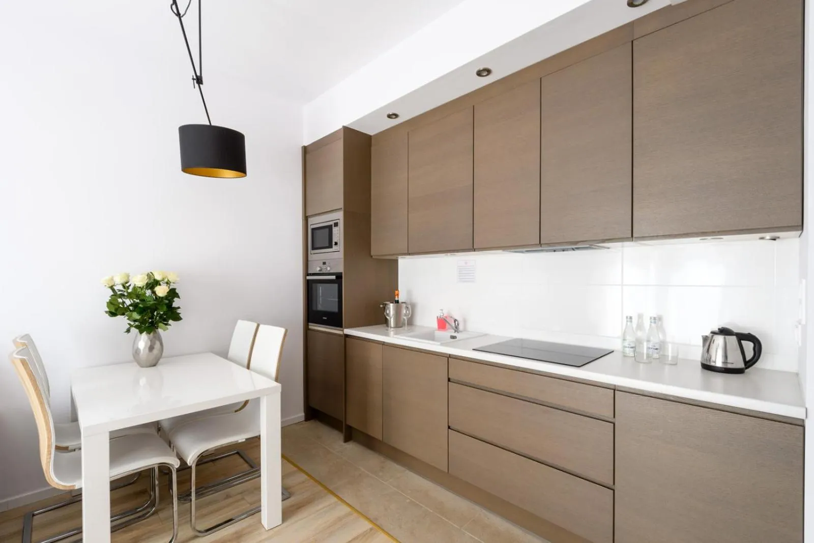 Kitchen or kitchenette in Varsovia Apartamenty Kasprzaka