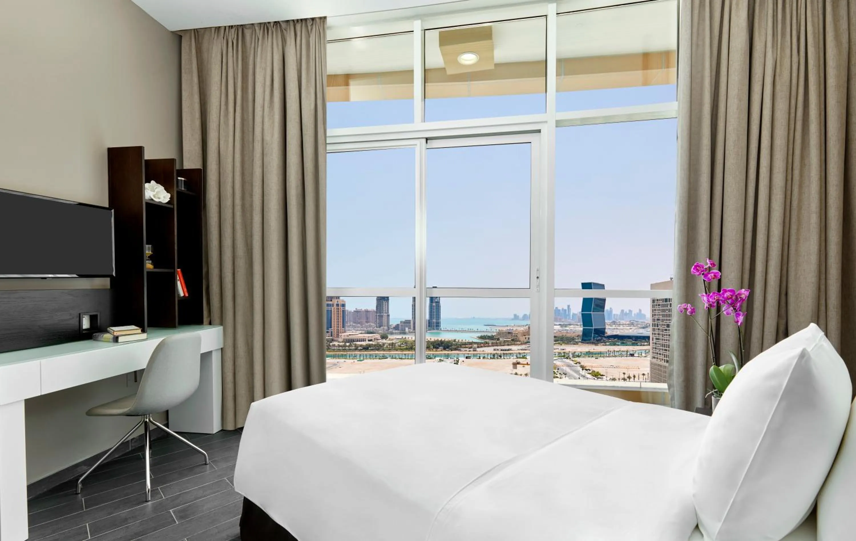 Photo of the whole room, Bed in Staybridge Suites - Doha Lusail by IHG