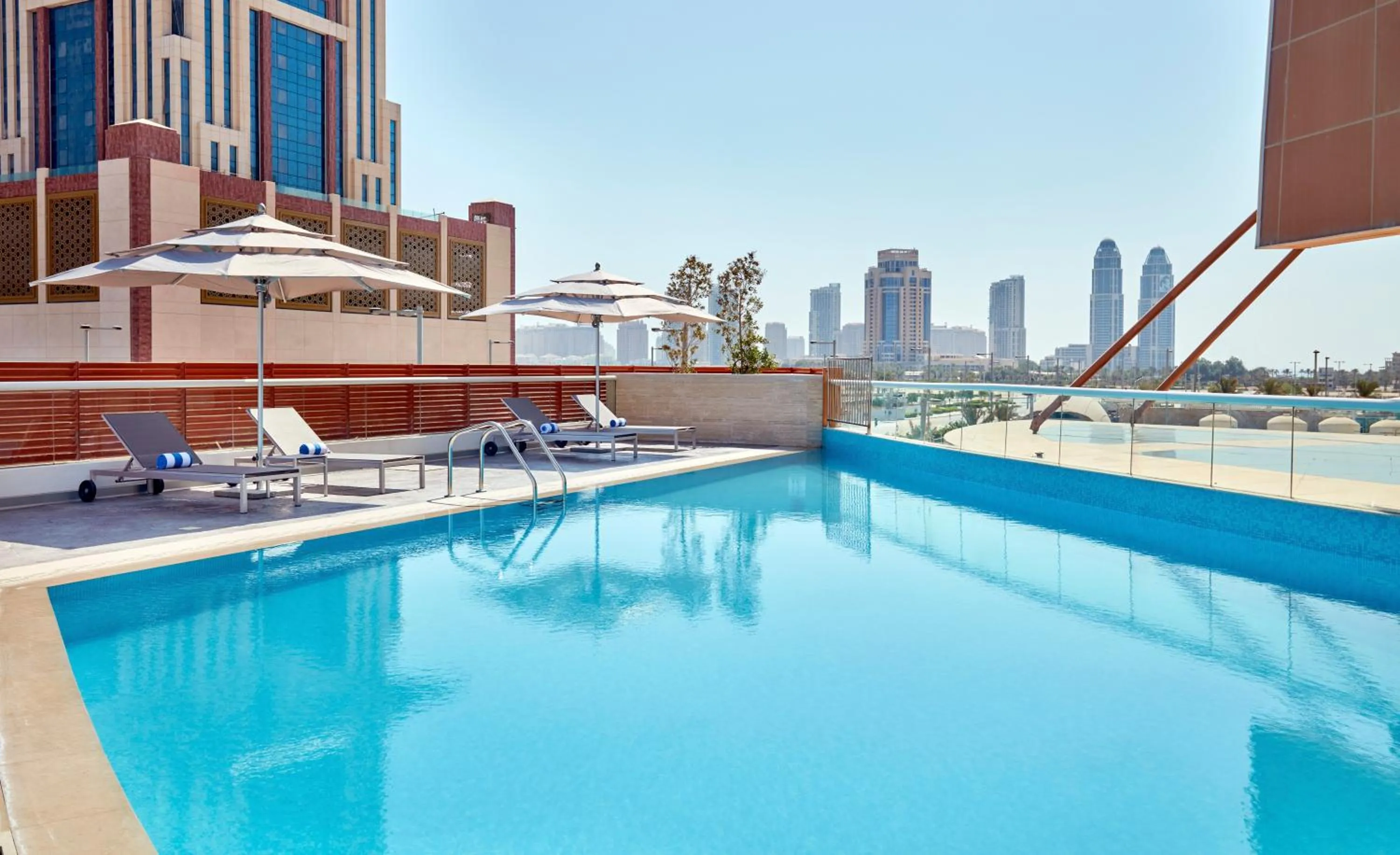 Swimming pool in Staybridge Suites - Doha Lusail by IHG