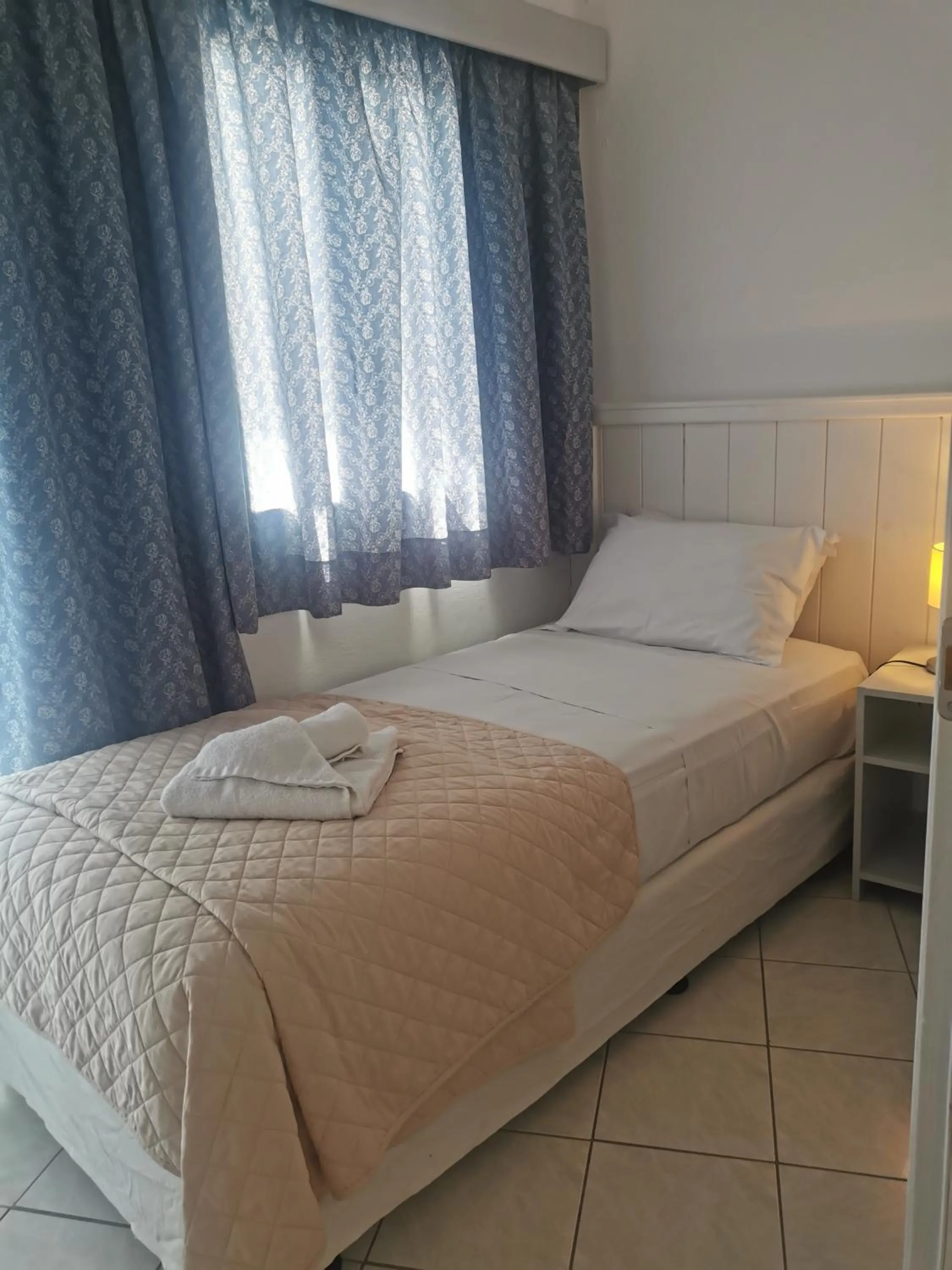 Bed in Naiades Almiros Hotel