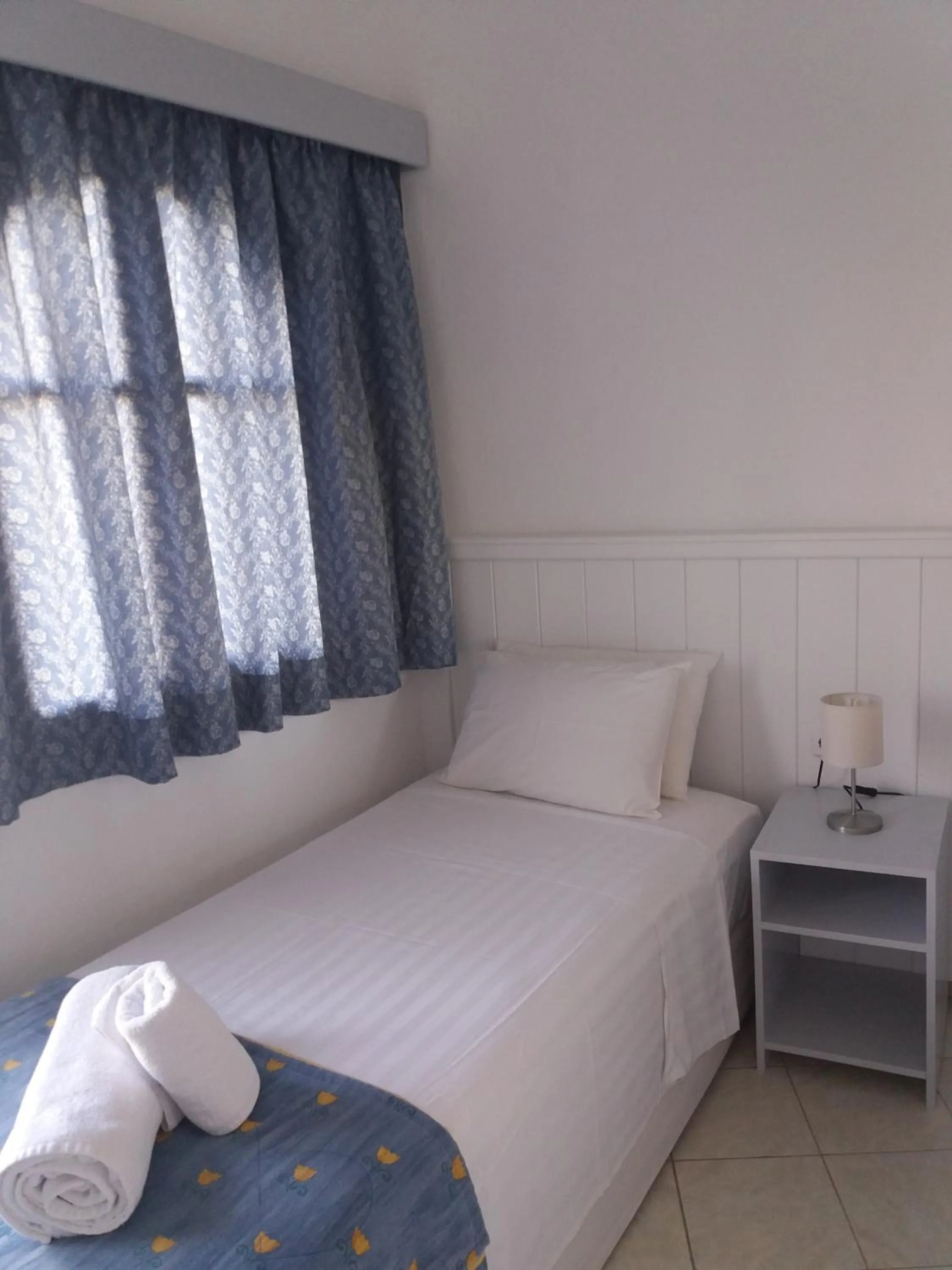 Bed in Naiades Almiros Hotel