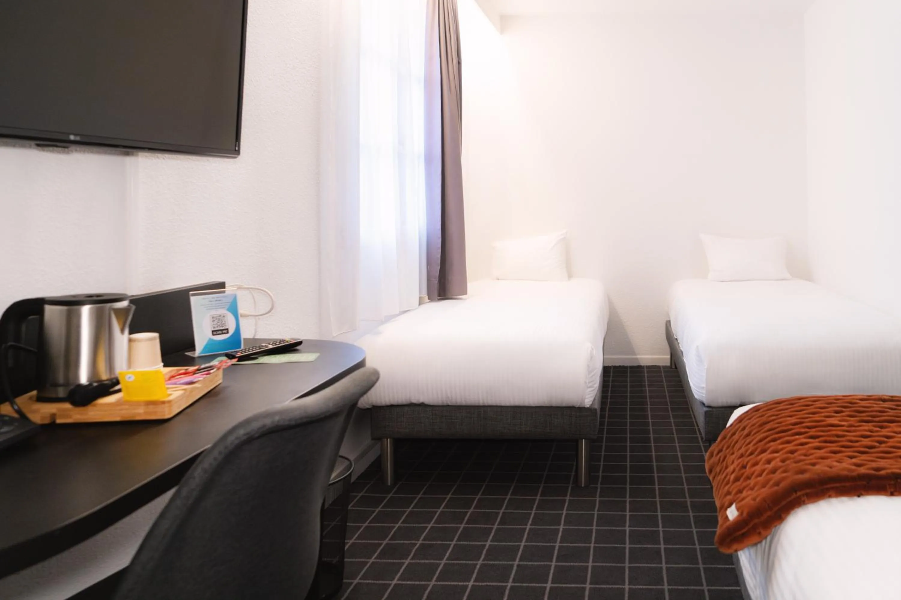 Bed in Hôtel du Beffroi Gravelines Dunkerque