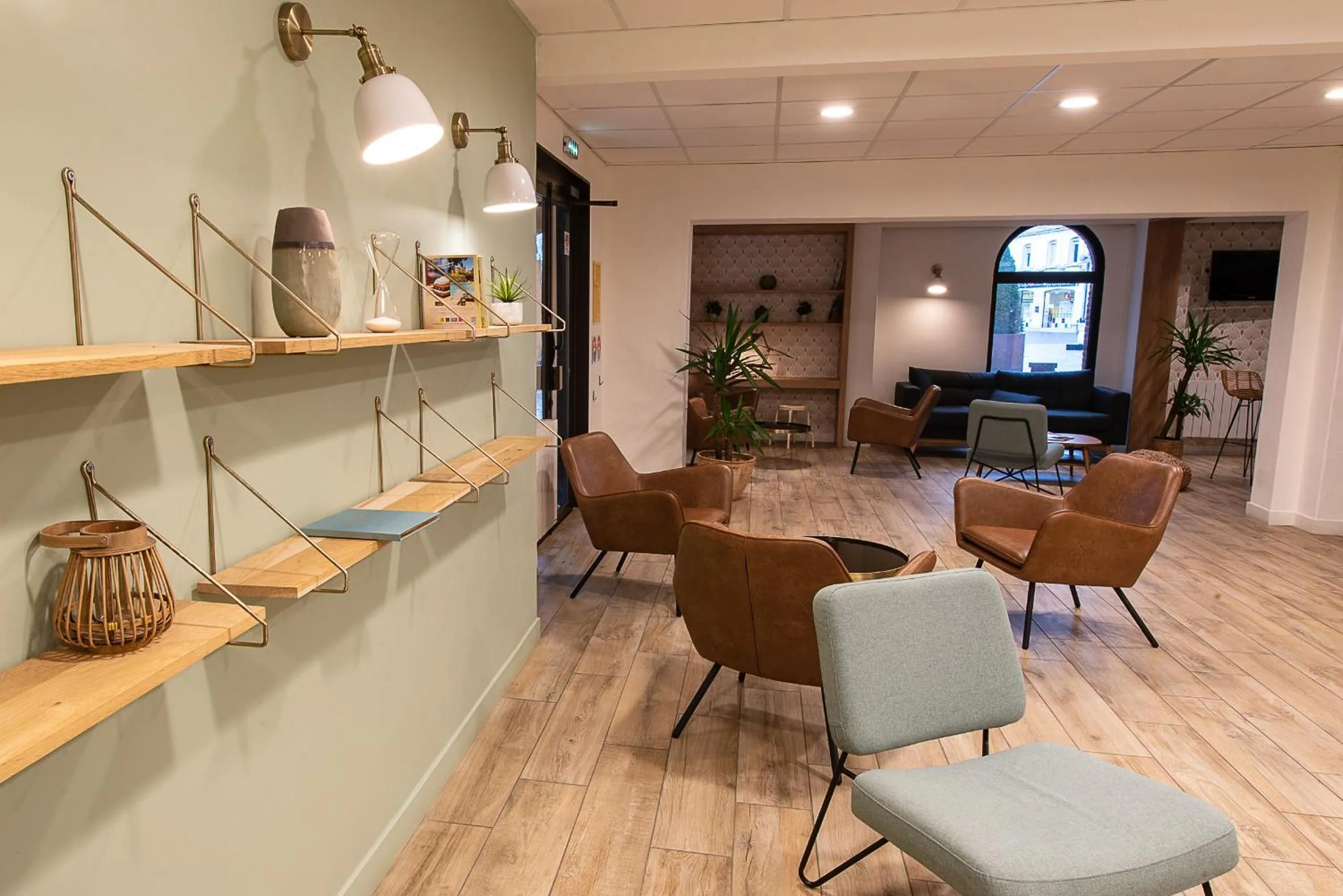 Communal lounge/ TV room in Hôtel du Beffroi Gravelines Dunkerque