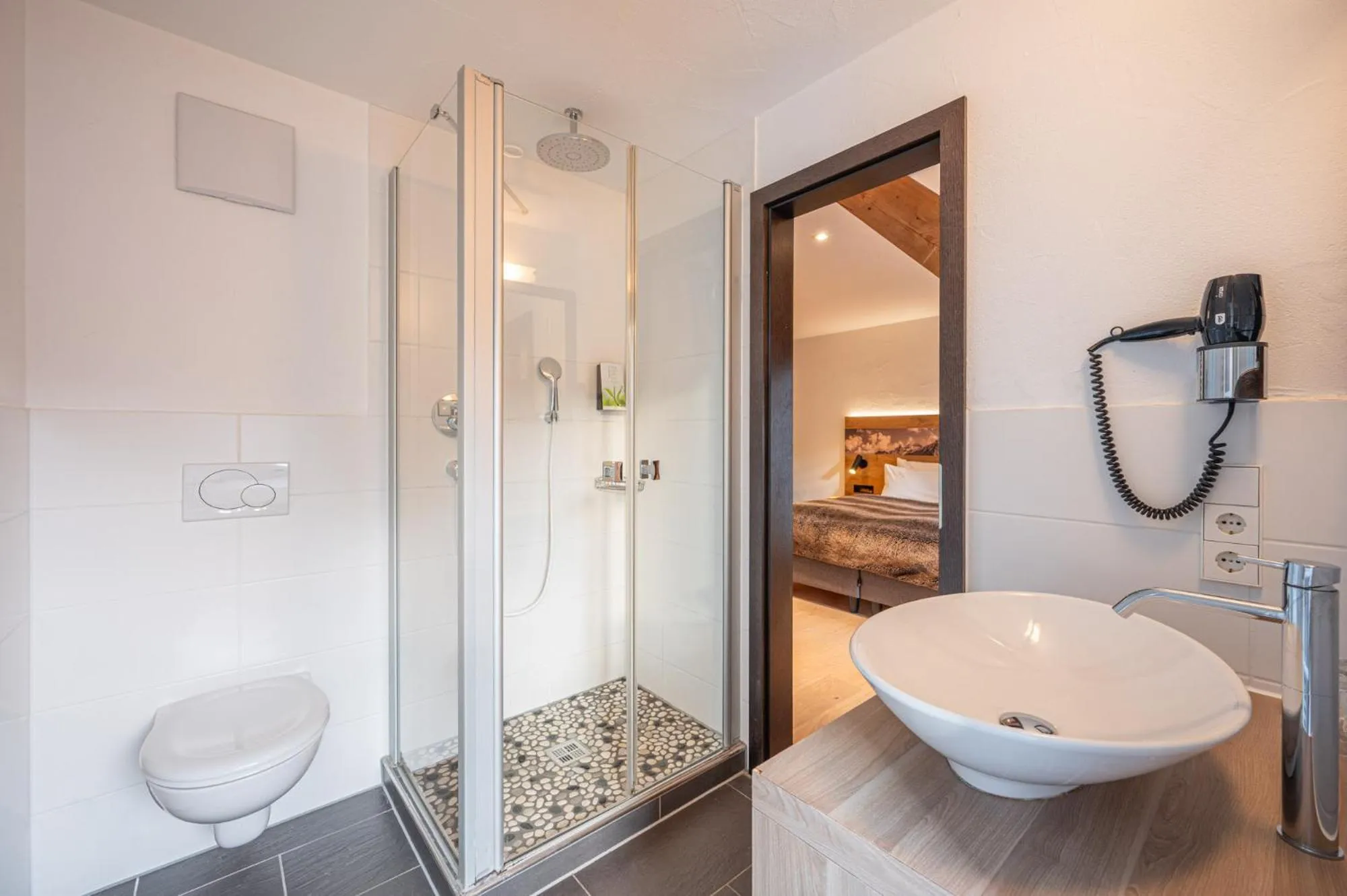 Bathroom, Bed in Alpin Lifestyle Hotel Löwen & Strauss