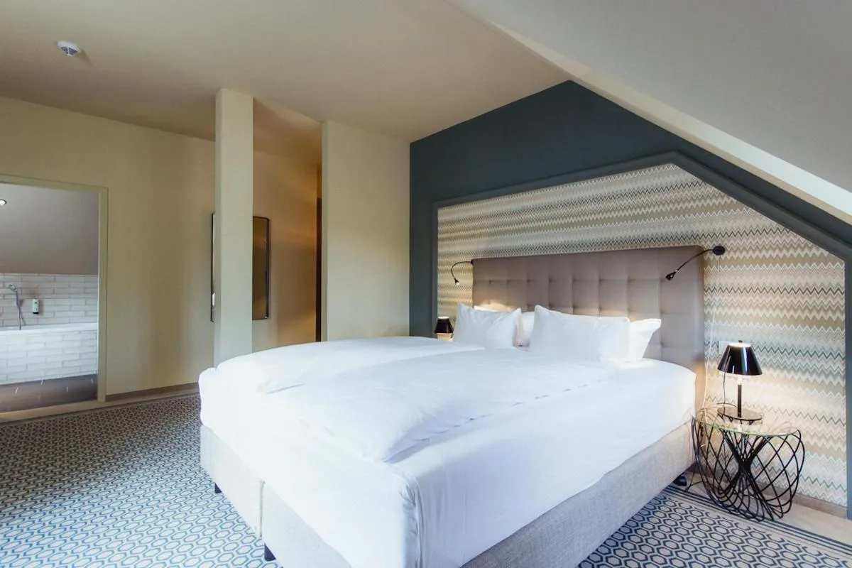 Bed in Hotel Goldene Traube - by Neugart