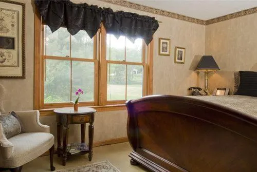 Bed in Inn at Ellis River