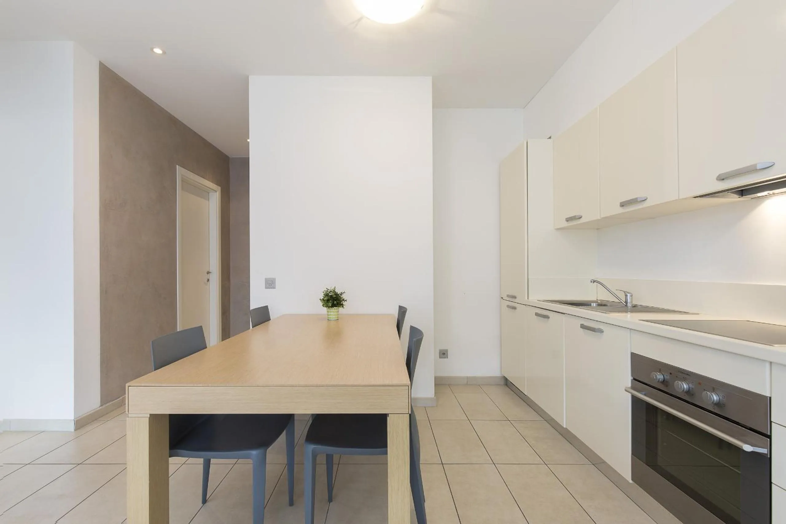 Kitchen or kitchenette in Prestige Apartments by Quokka 360 - spacious flats with terraces