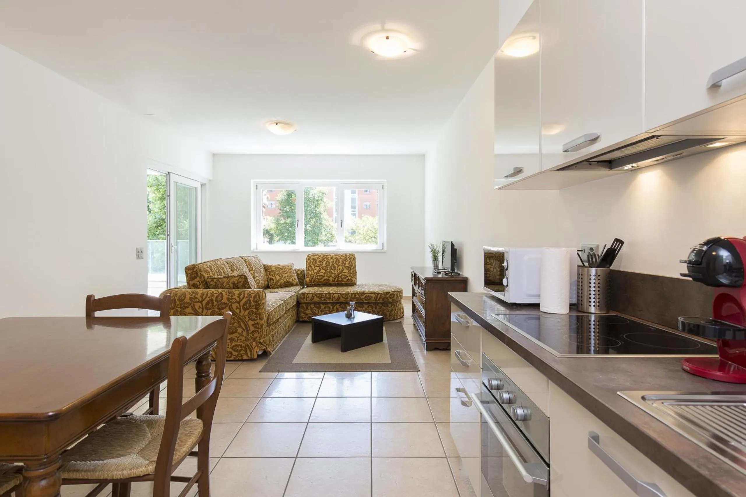 Kitchen or kitchenette in Prestige Apartments by Quokka 360 - spacious flats with terraces