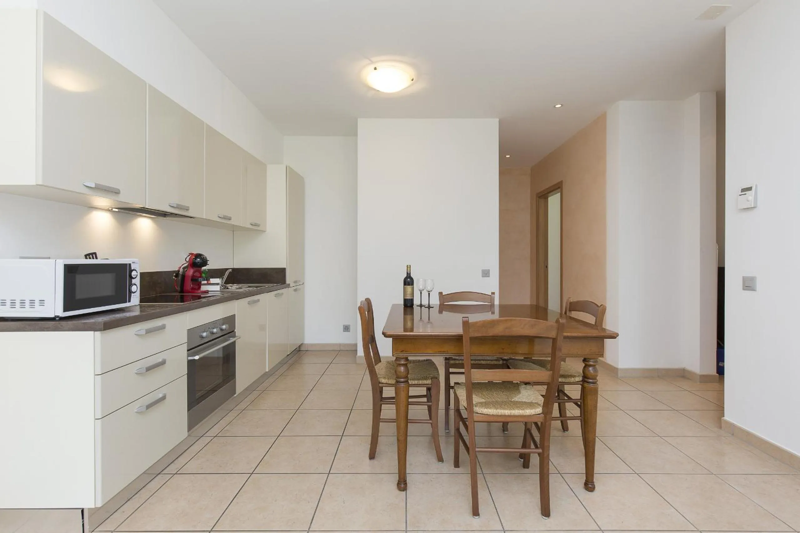 Kitchen or kitchenette in Prestige Apartments by Quokka 360 - spacious flats with terraces