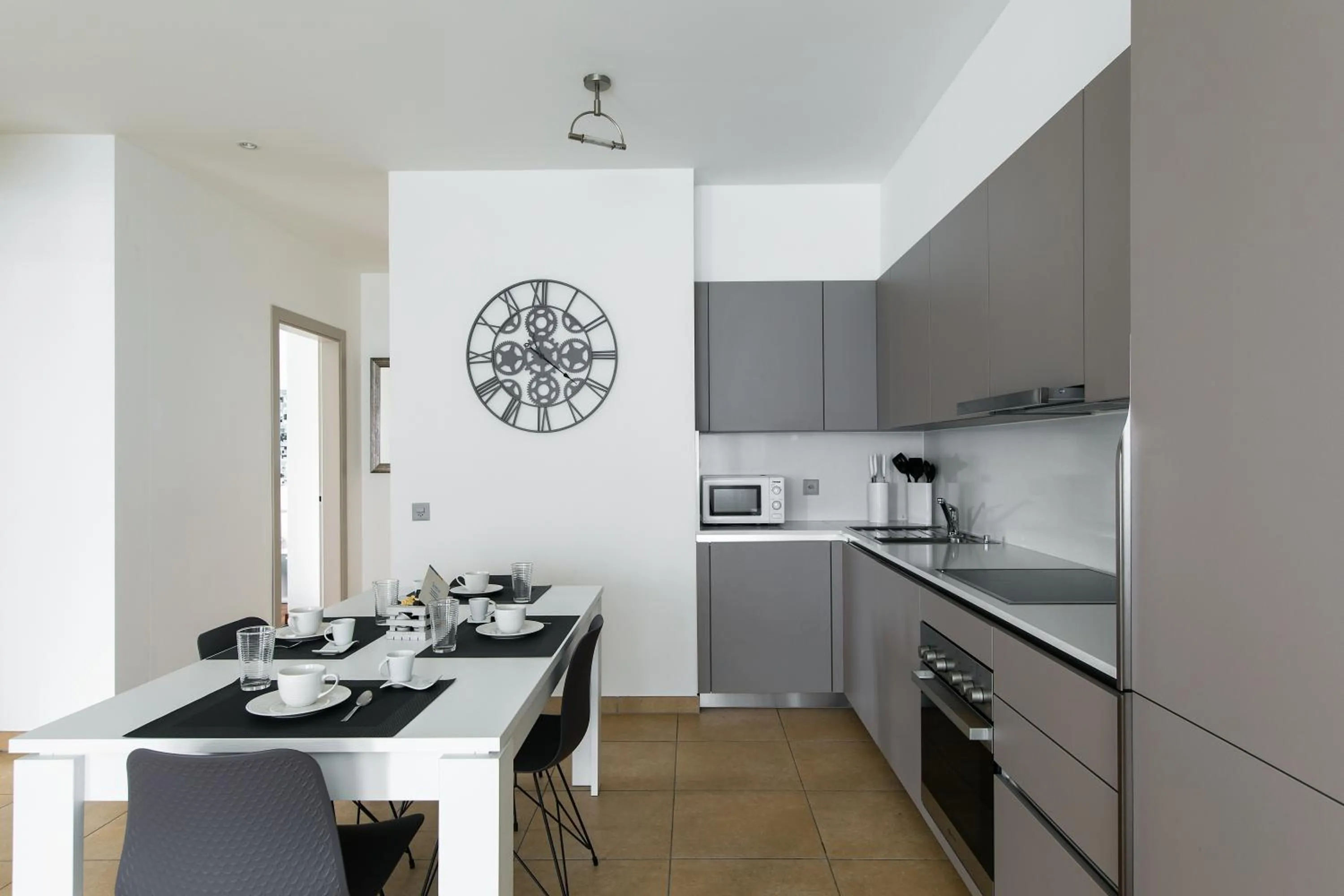 Kitchen or kitchenette in Prestige Apartments by Quokka 360 - spacious flats with terraces