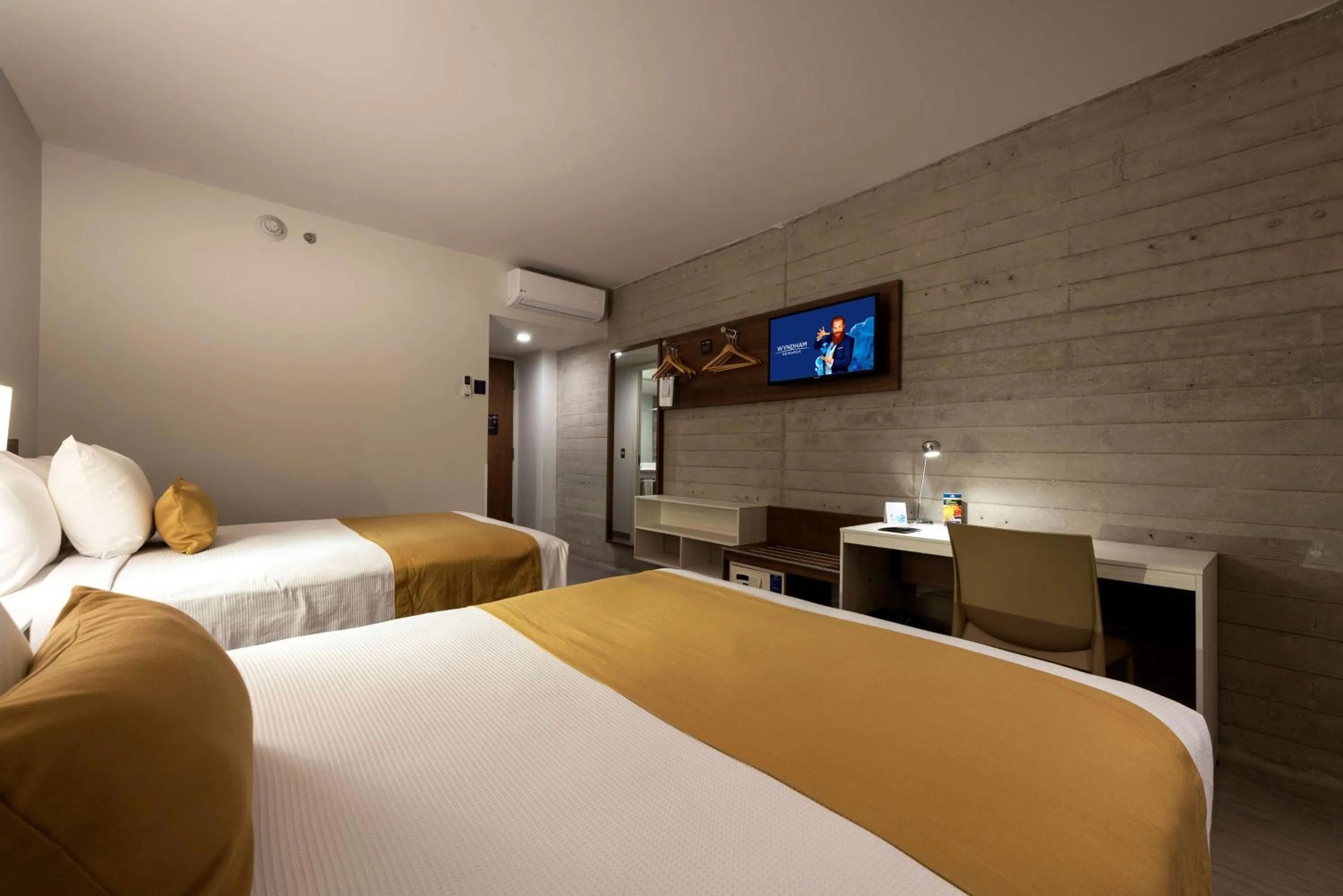TV and multimedia, Bed in Microtel Inn & Suites by Wyndham San Luis Potosi