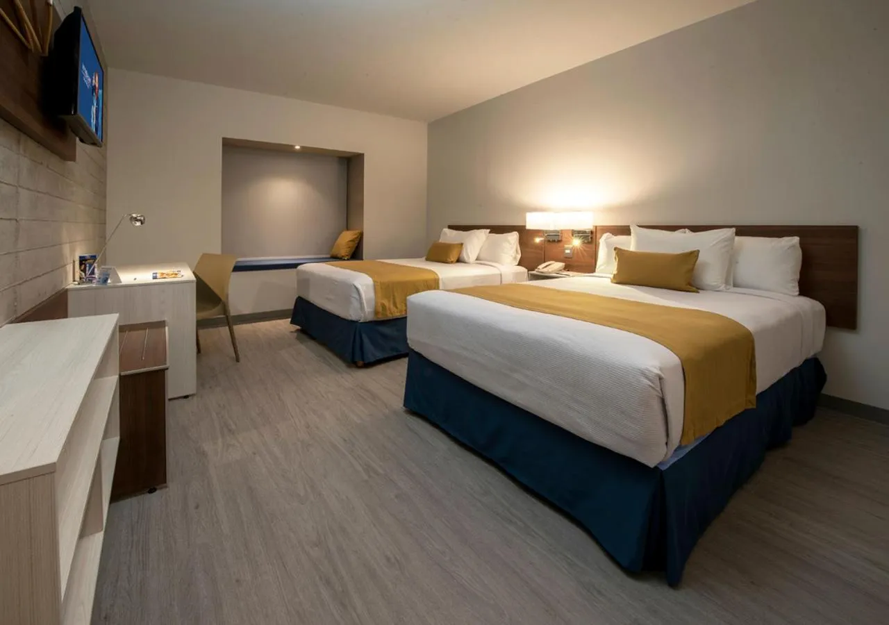 Bed in Microtel Inn & Suites by Wyndham San Luis Potosi