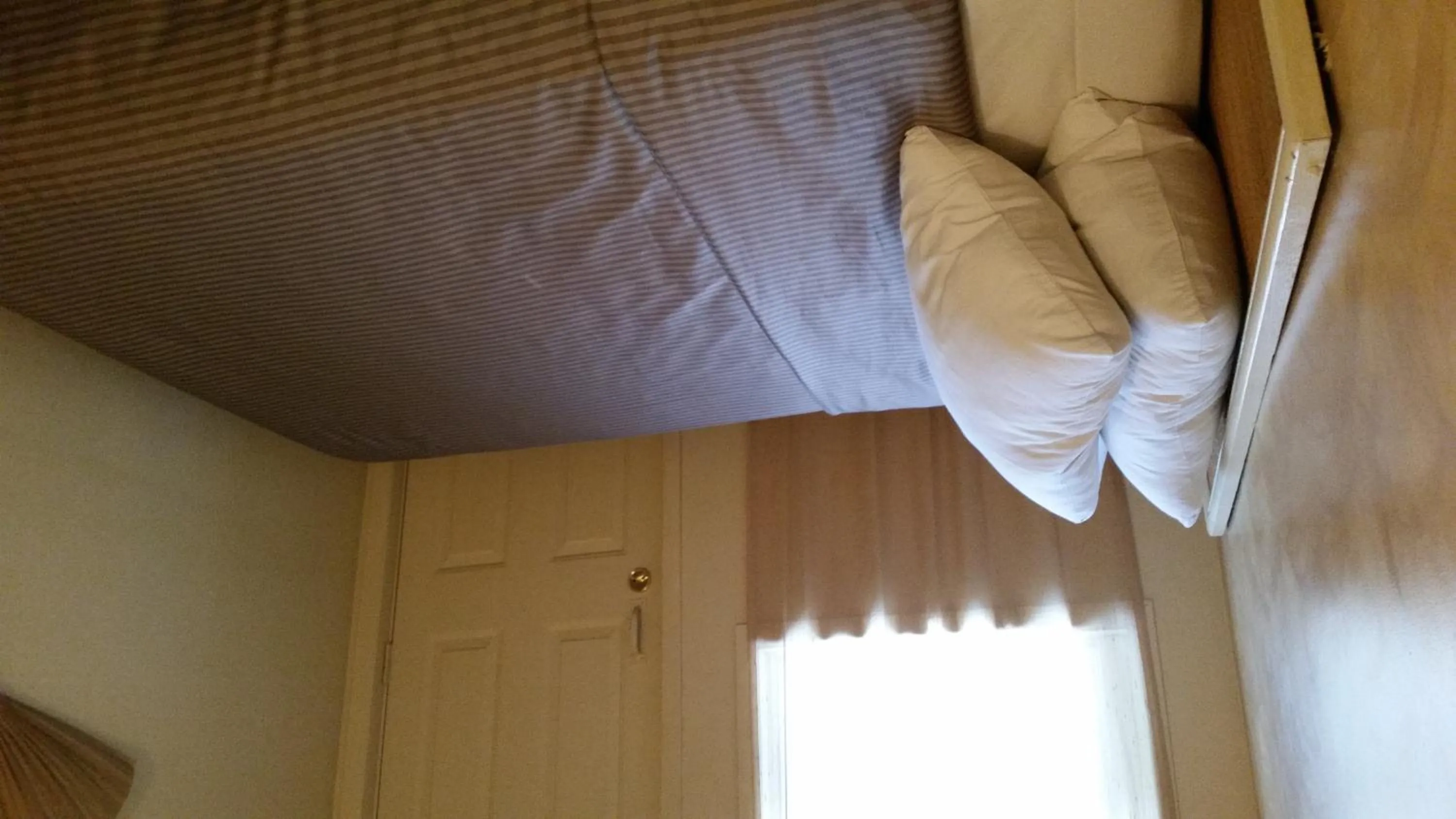 Bed in A Voyageur's Guest House