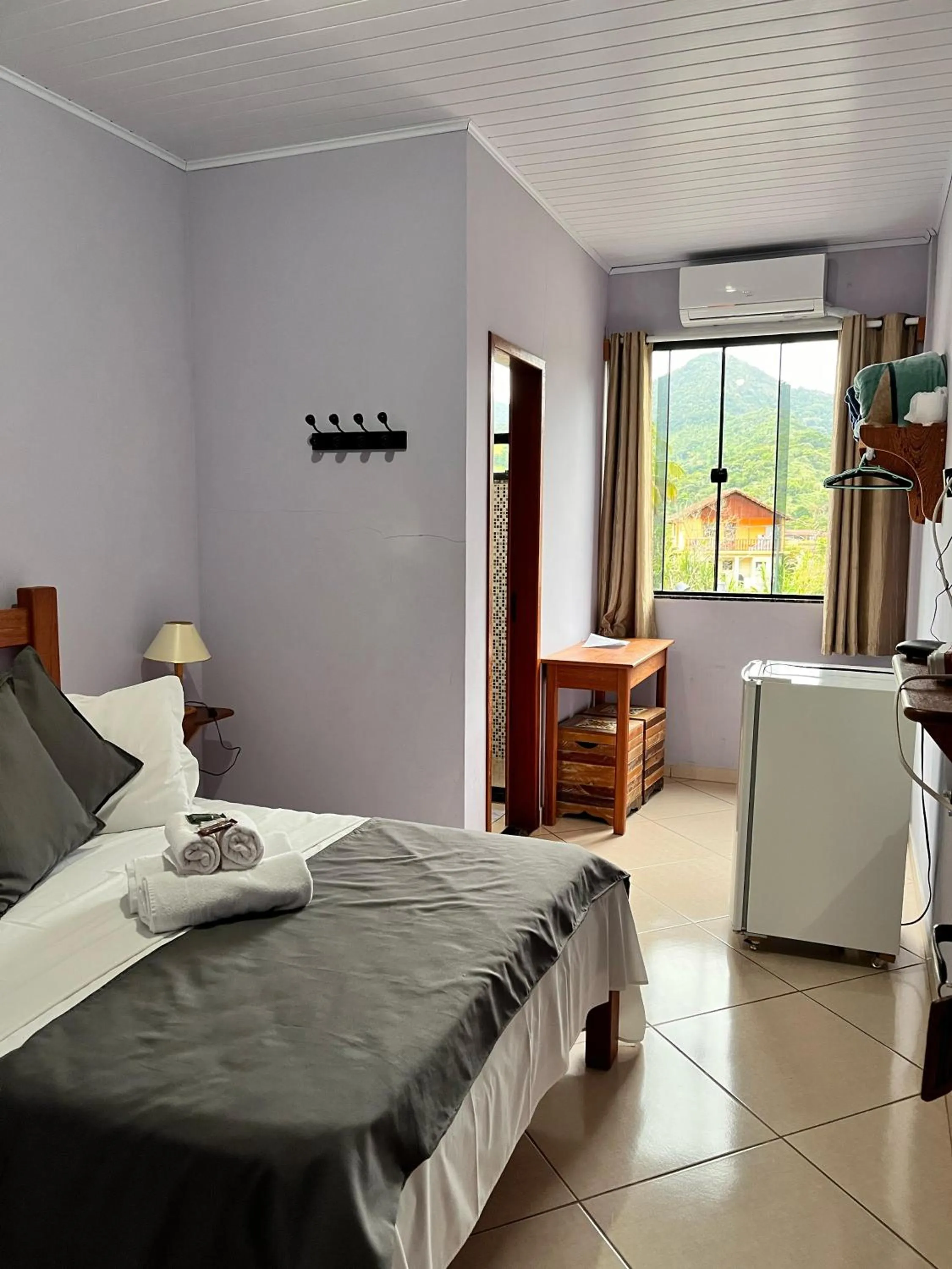 Photo of the whole room, Bed in Hotel Lumiar