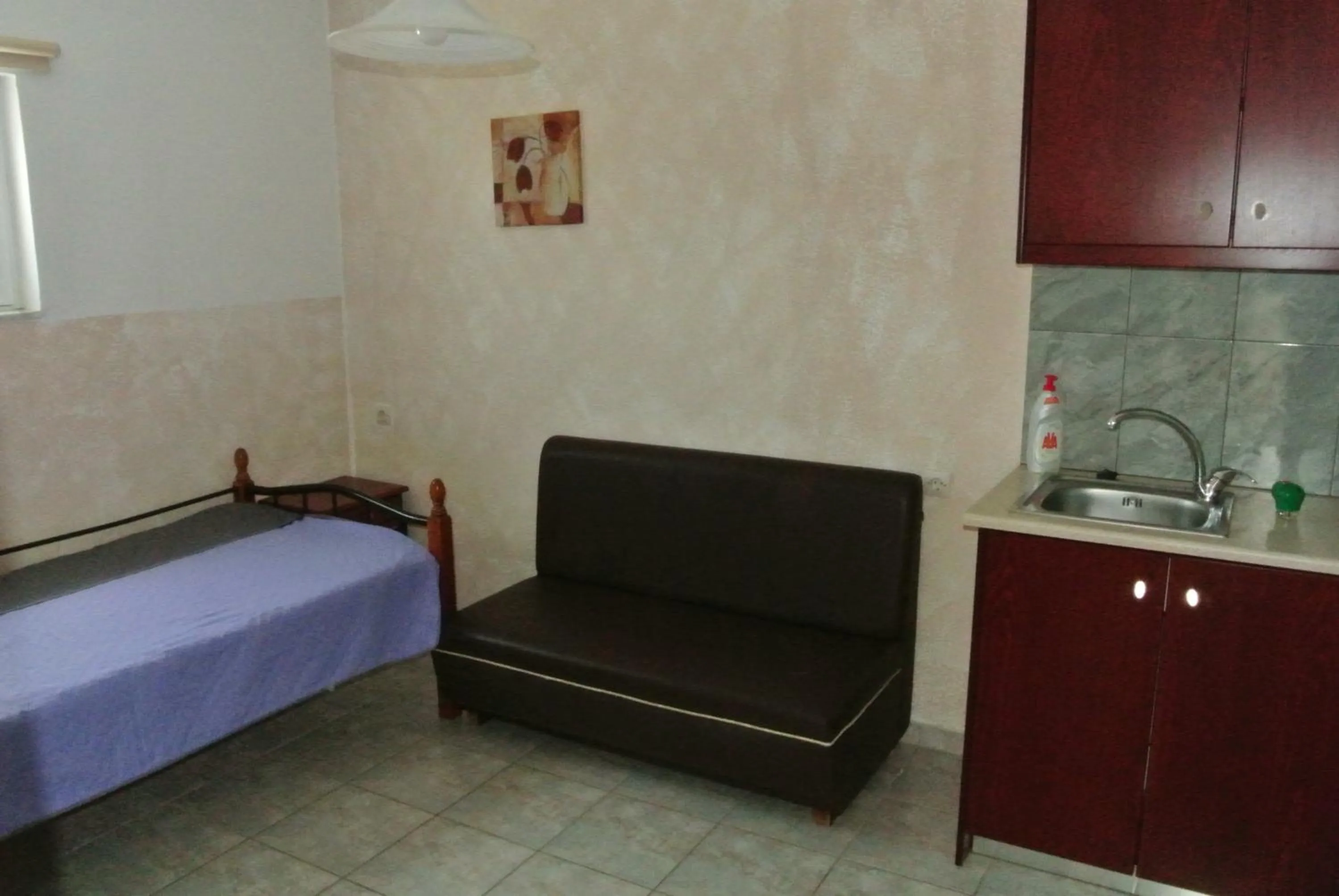 Kitchen or kitchenette, Bed in Kokalakis Hotel