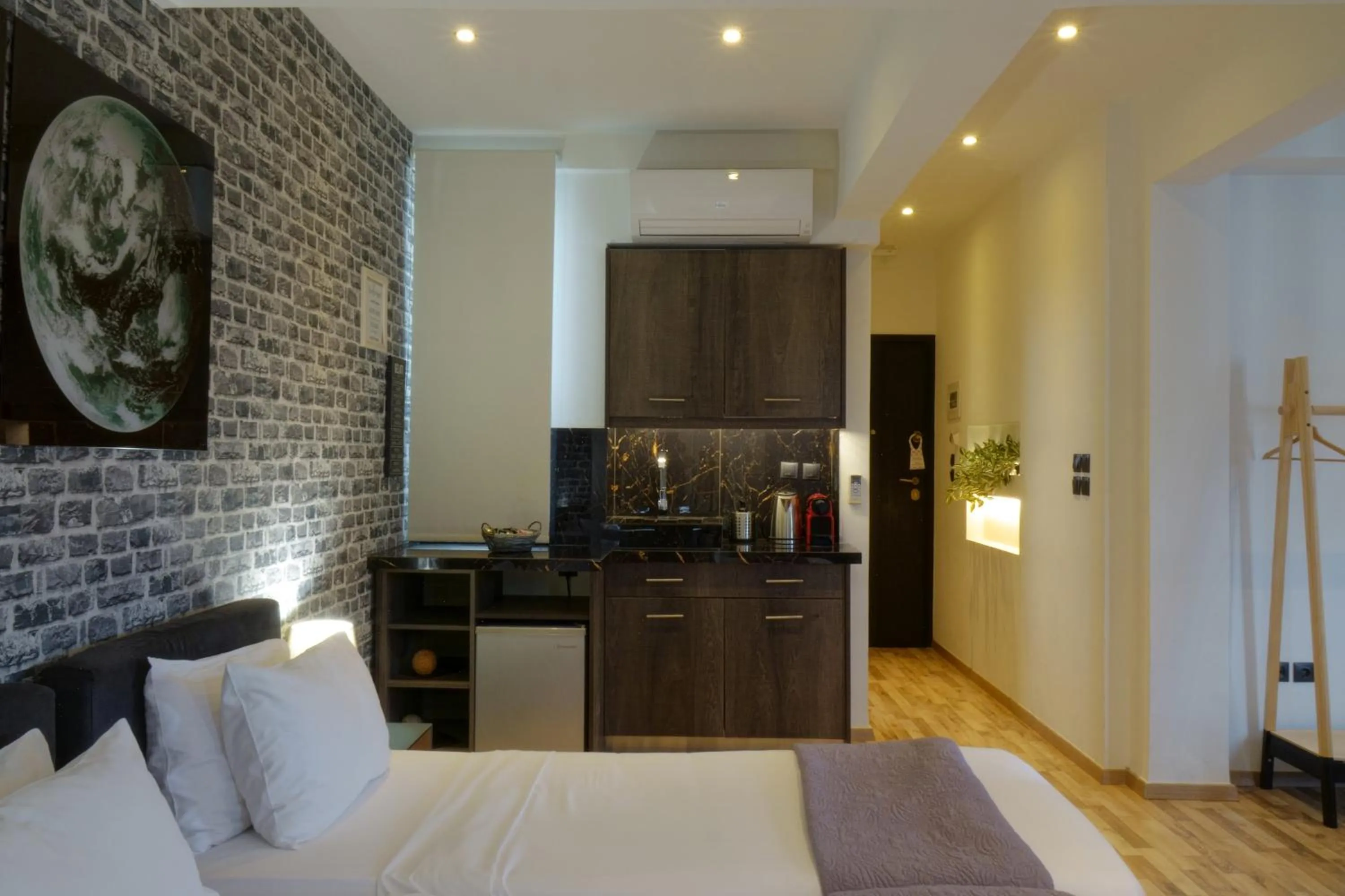 Kitchen or kitchenette, Bed in The Athens Version Luxury Suites