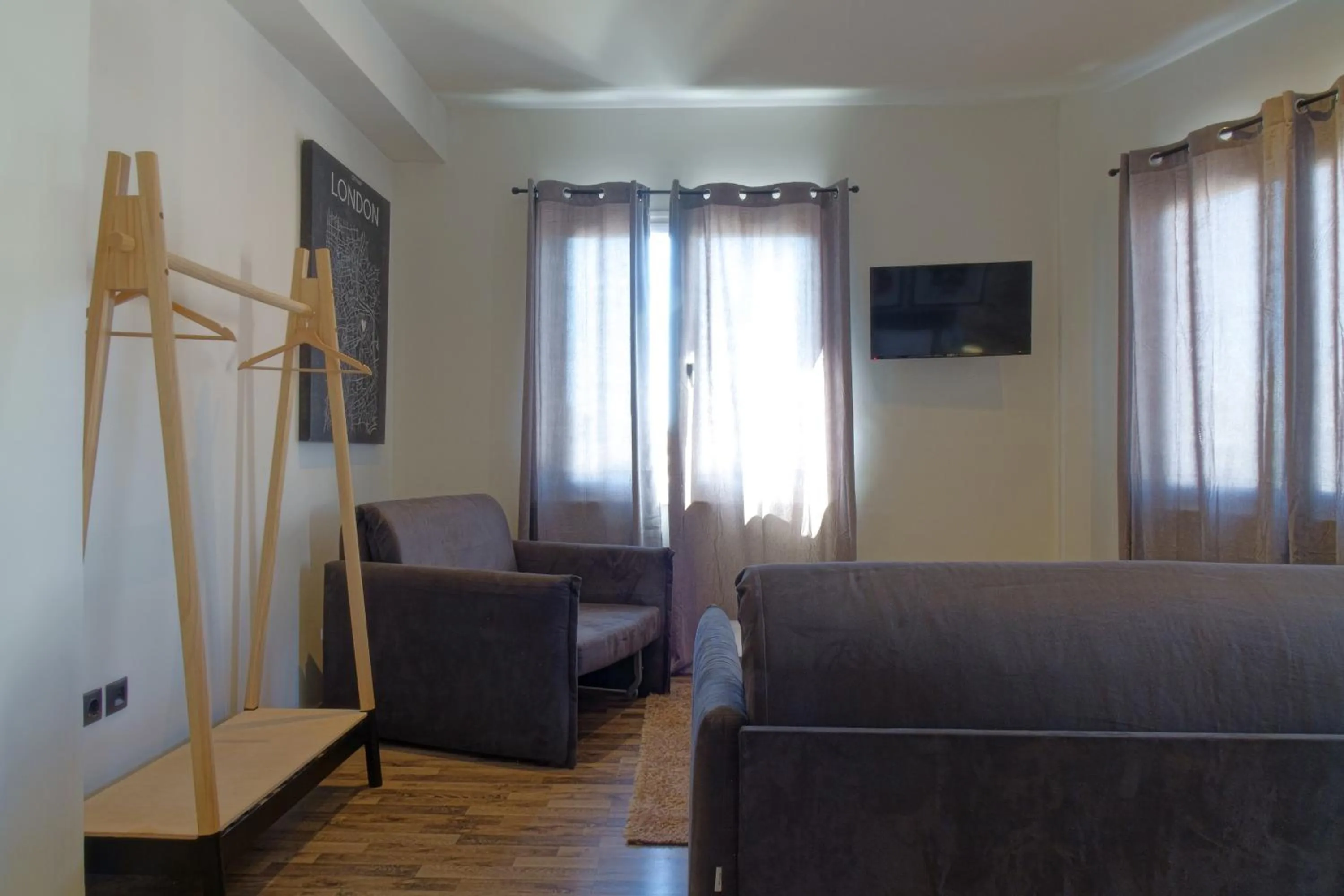 Living room in The Athens Version Luxury Suites